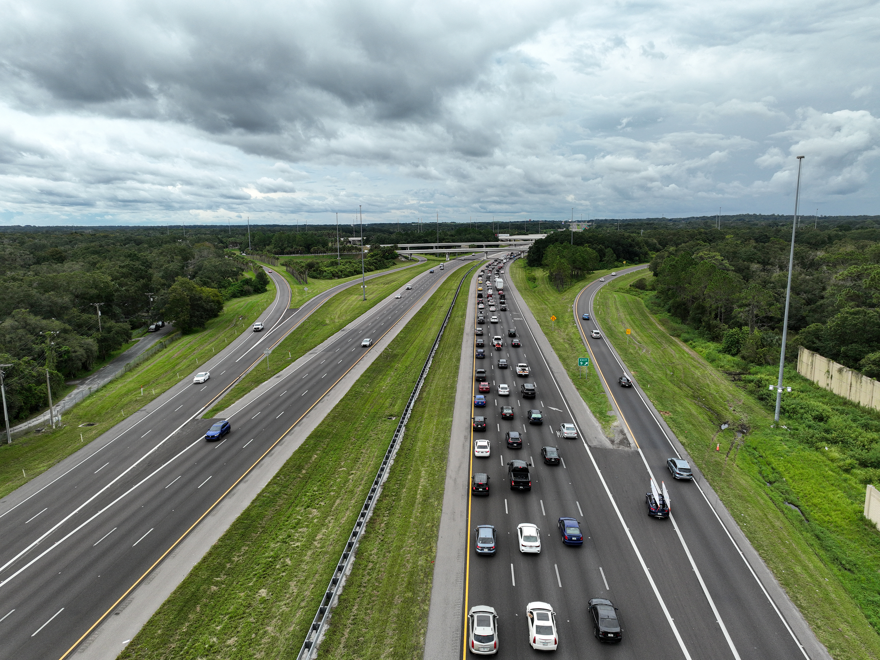 Tampa Bay area residents and drivers fill the lanes on I-4 as they escape the high winds and flood waters of Hurricane Ian with just a day left before the storm lands in Tampa, Florida on Tuesday.