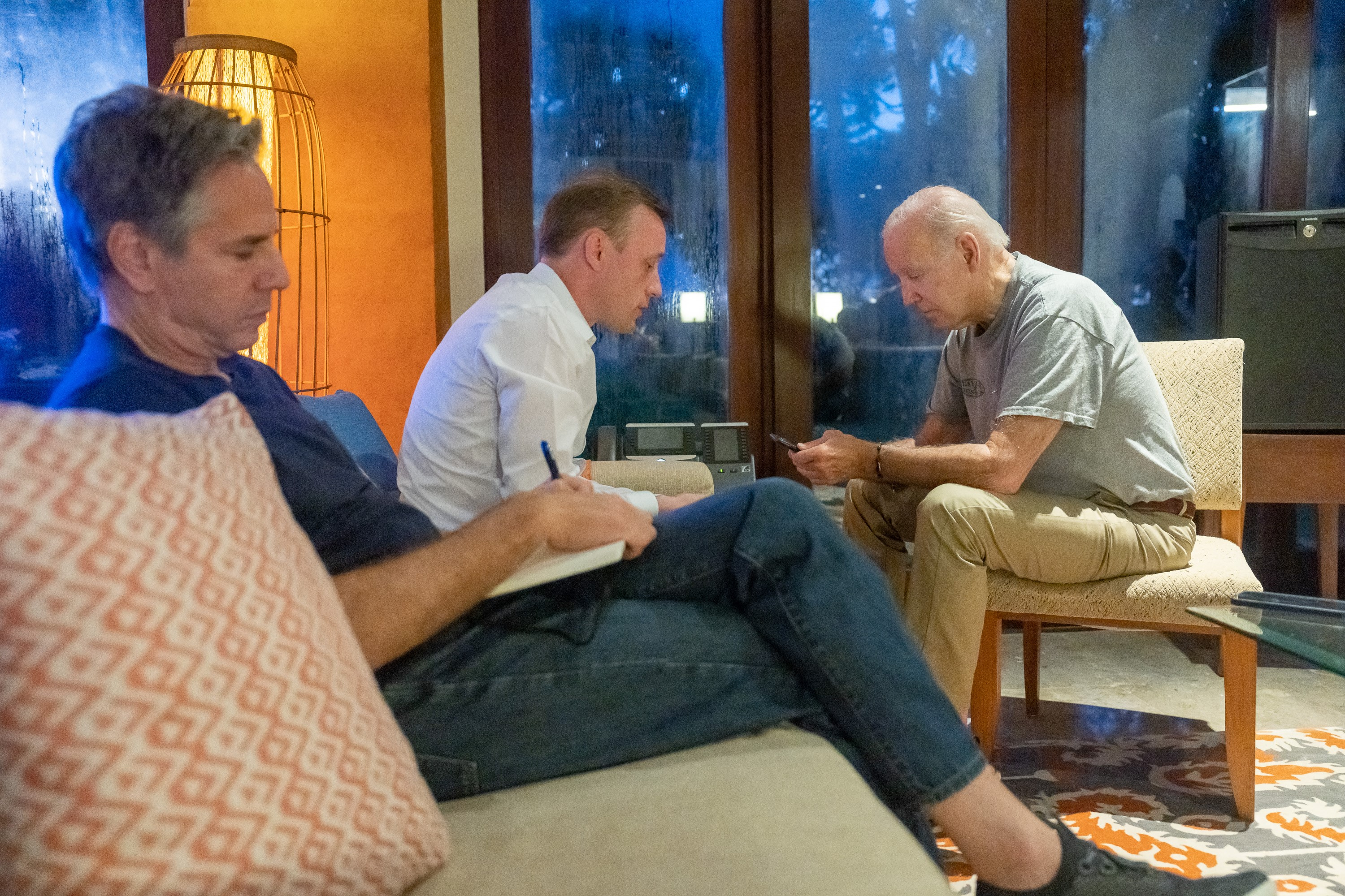 US President Joe Biden, right, spoke with Polish President Andrzej Duda on the phone from his hotel in Bali. He was joined by Secretary of State Blinken, left, and National Security Adviser Jake Sullivan, center.