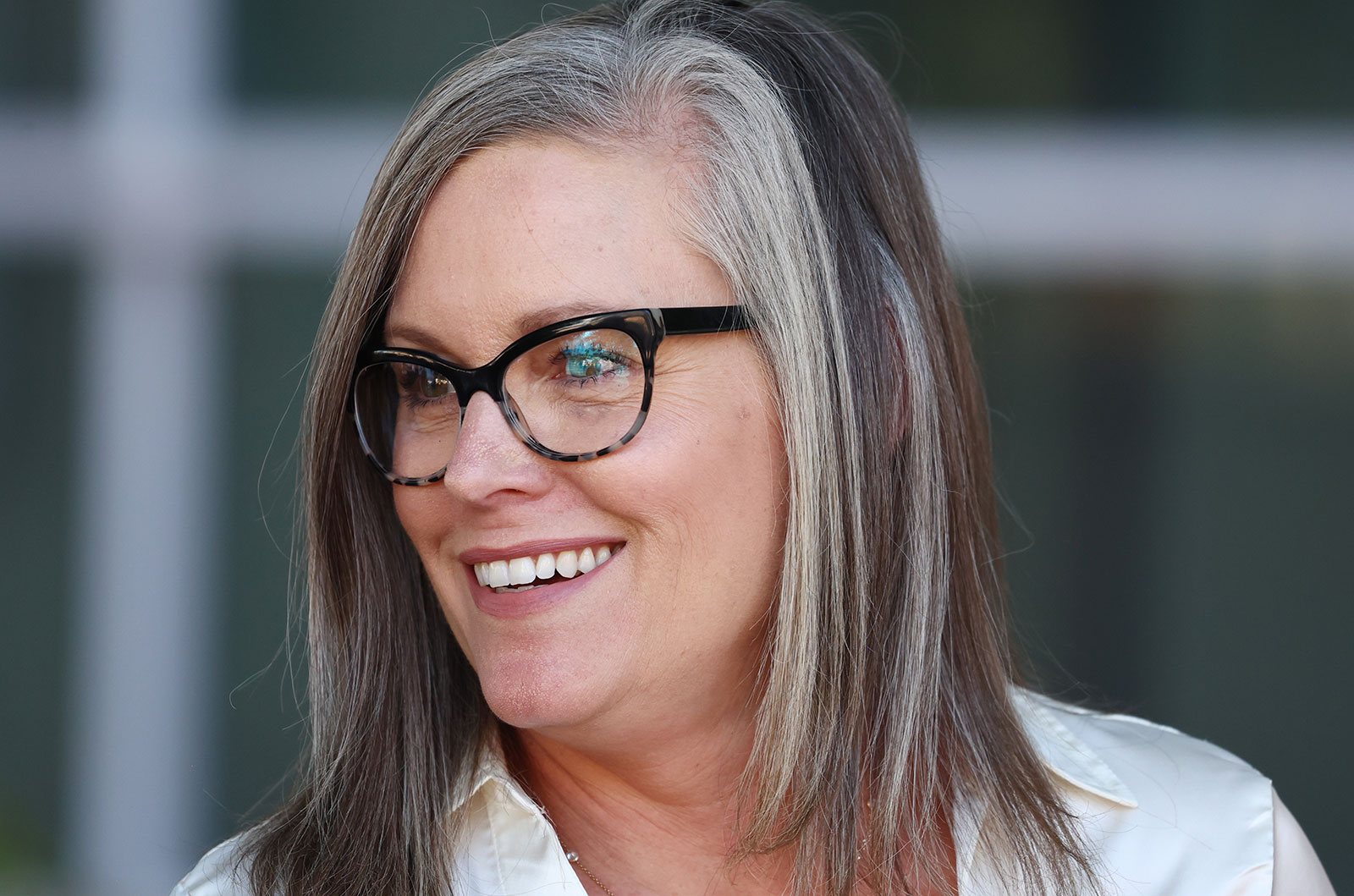 Katie Hobbs participates in a press conference in Tucson, Arizona on Octob