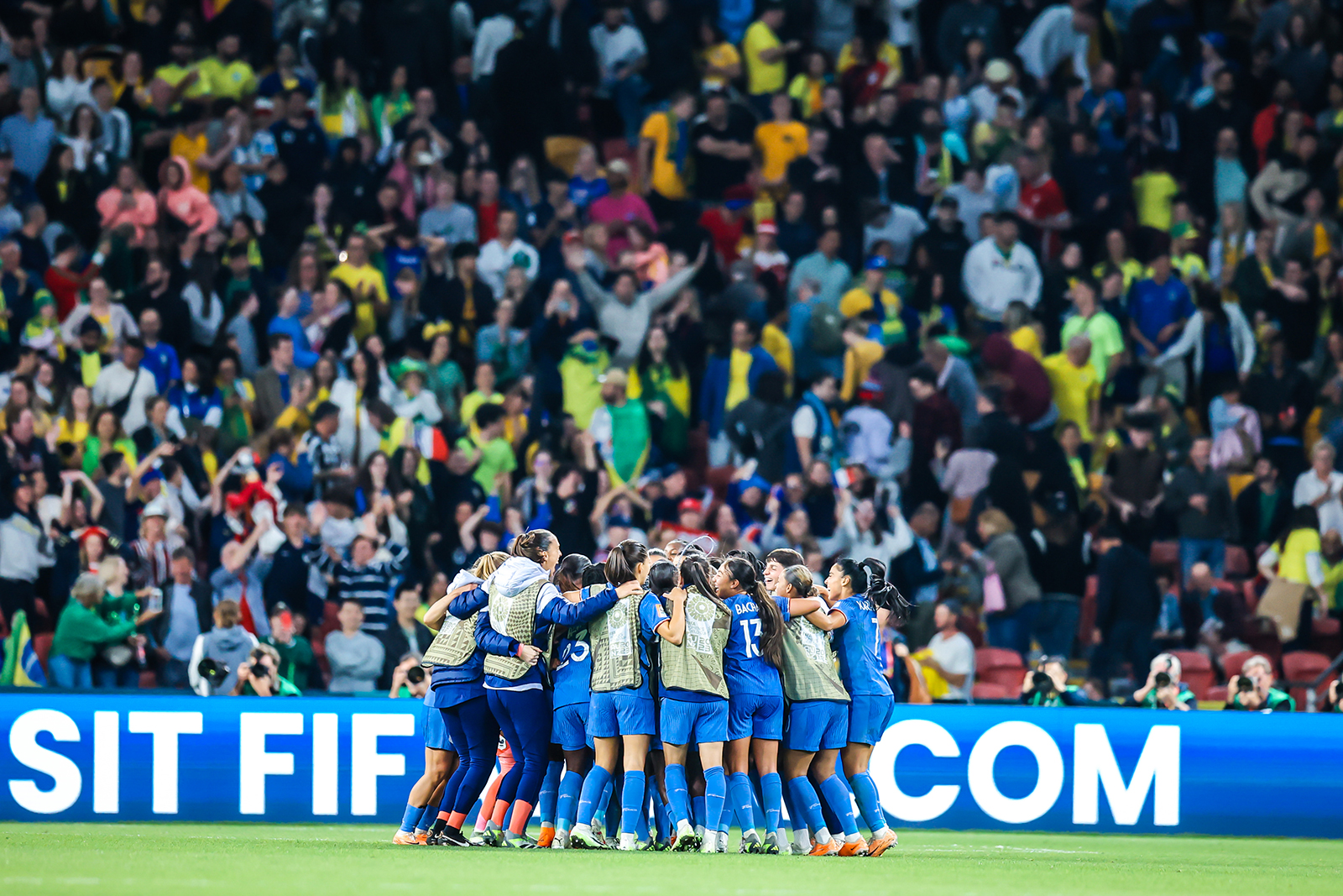 French players celebrate beating Brazil at Brisbane Stadium on July 29.