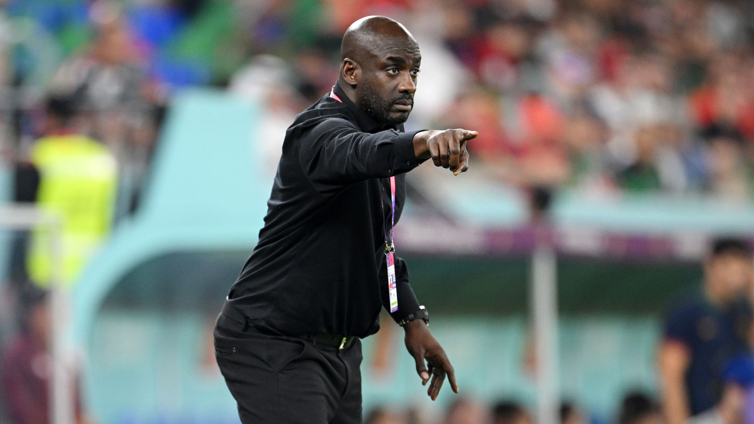 Ghana's Otto Addo gives his team instructions during the match against Portugal.