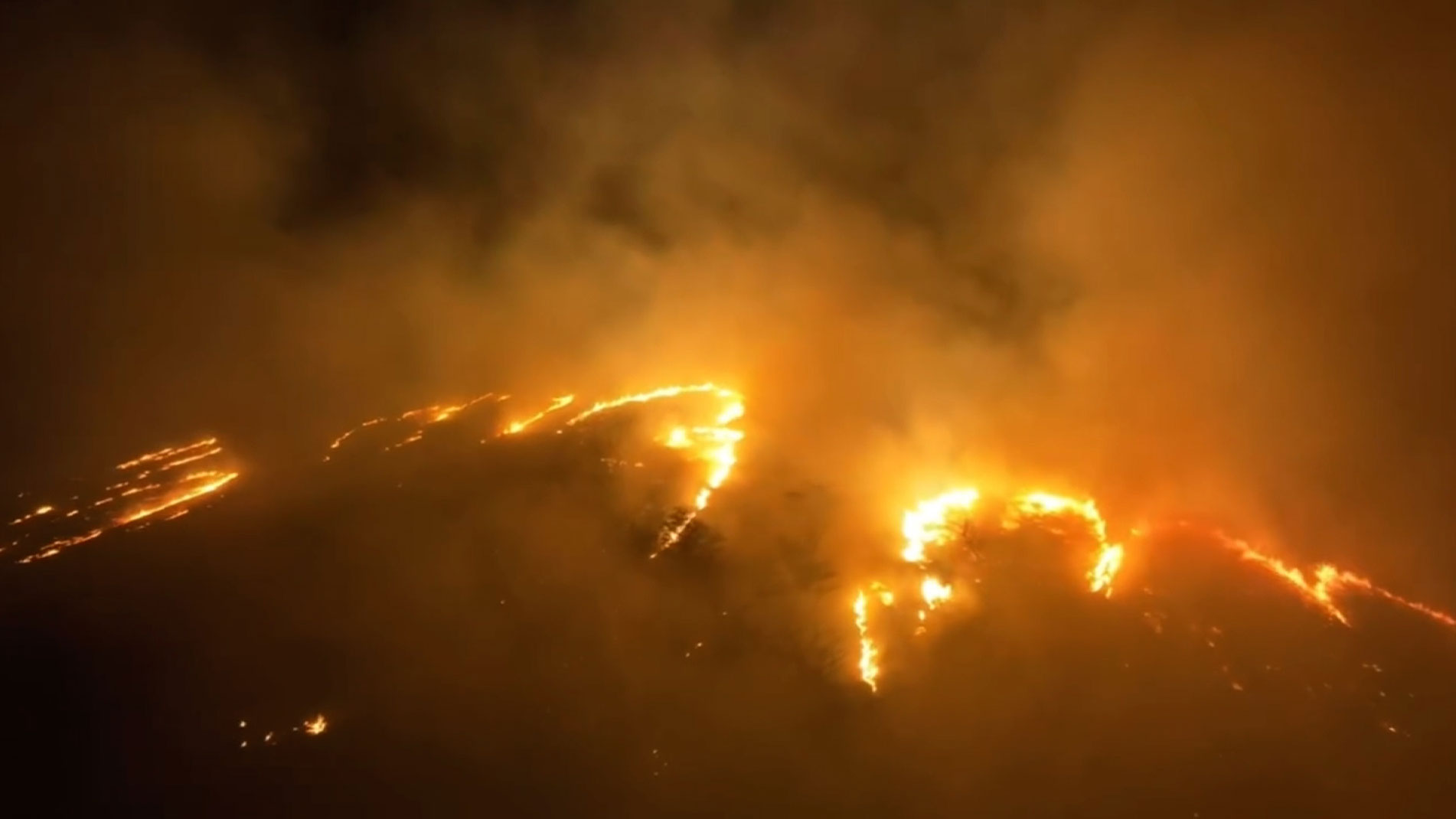 Clint Hansen took drone video at 11:30 pm on August 8 that shows wildfires spreading across just north of Kihei.