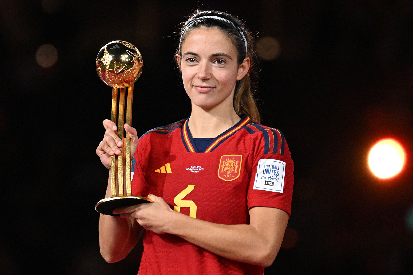 Spanish midfielder Aitana Bonmati poses after receiving the Golden Ball award.