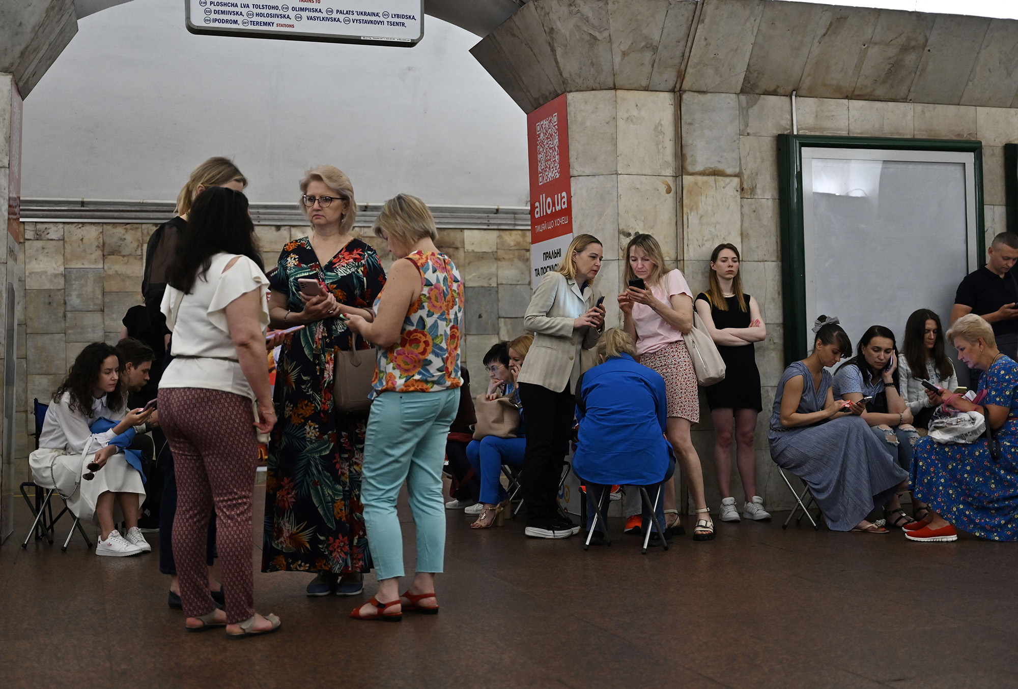 Local residents take shelter in a metro station in the centre of Kyiv, Ukraine, during a Russian missile attack on June 16.