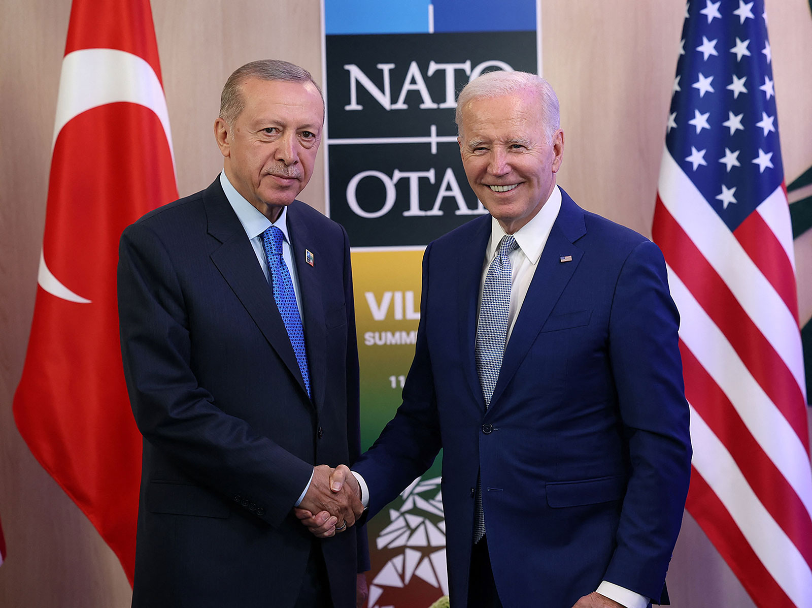 Turkish President Recep Tayyip Erdogan and US President Joe Biden shake hands during a NATO leaders summit in Vilnius, Lithuania July 11.