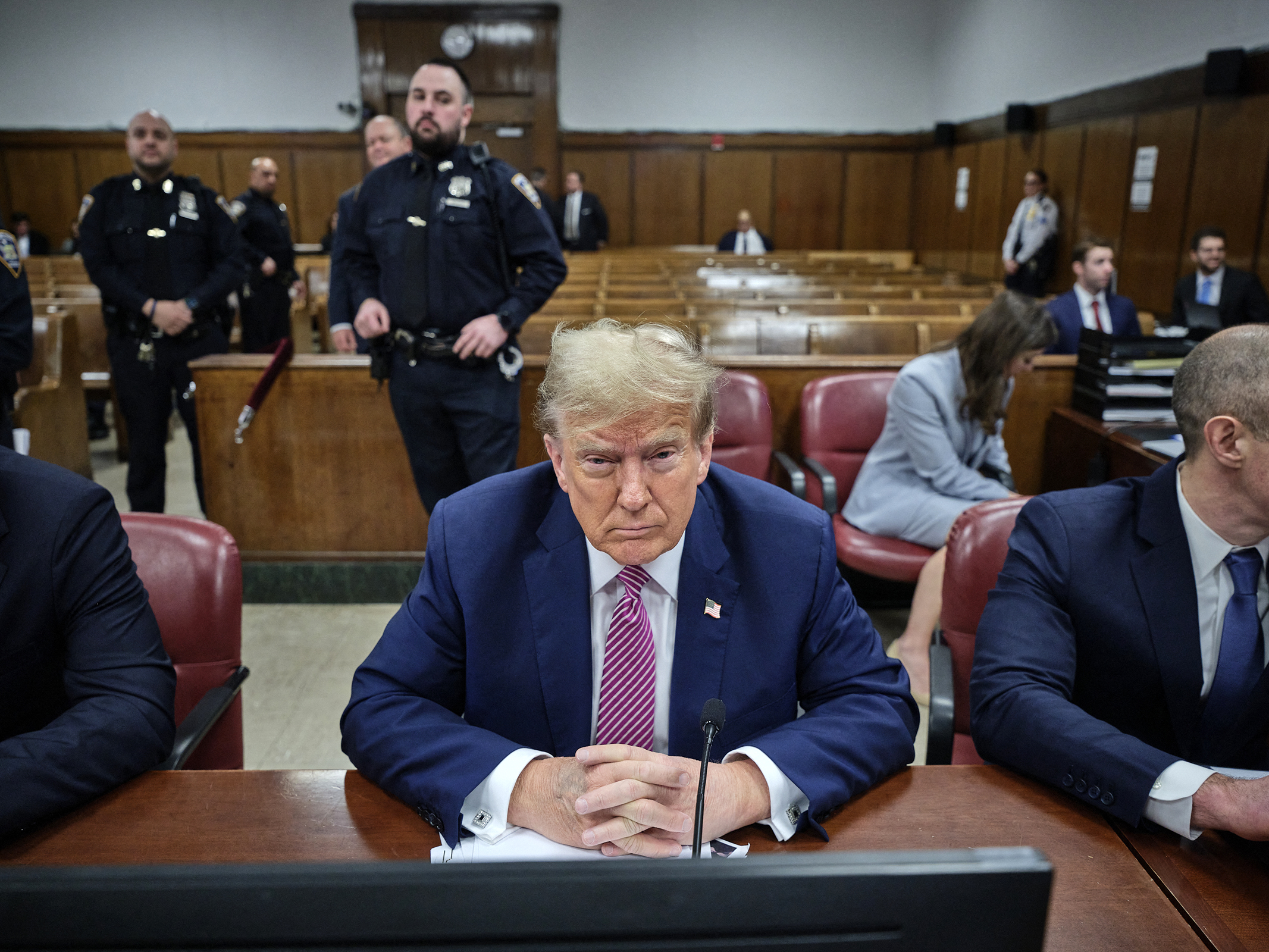 Former US President Donald Trump attends his trial for allegedly covering up hush money payments linked to extramarital affairs, at Manhattan Criminal Court in New York City on April 19. 