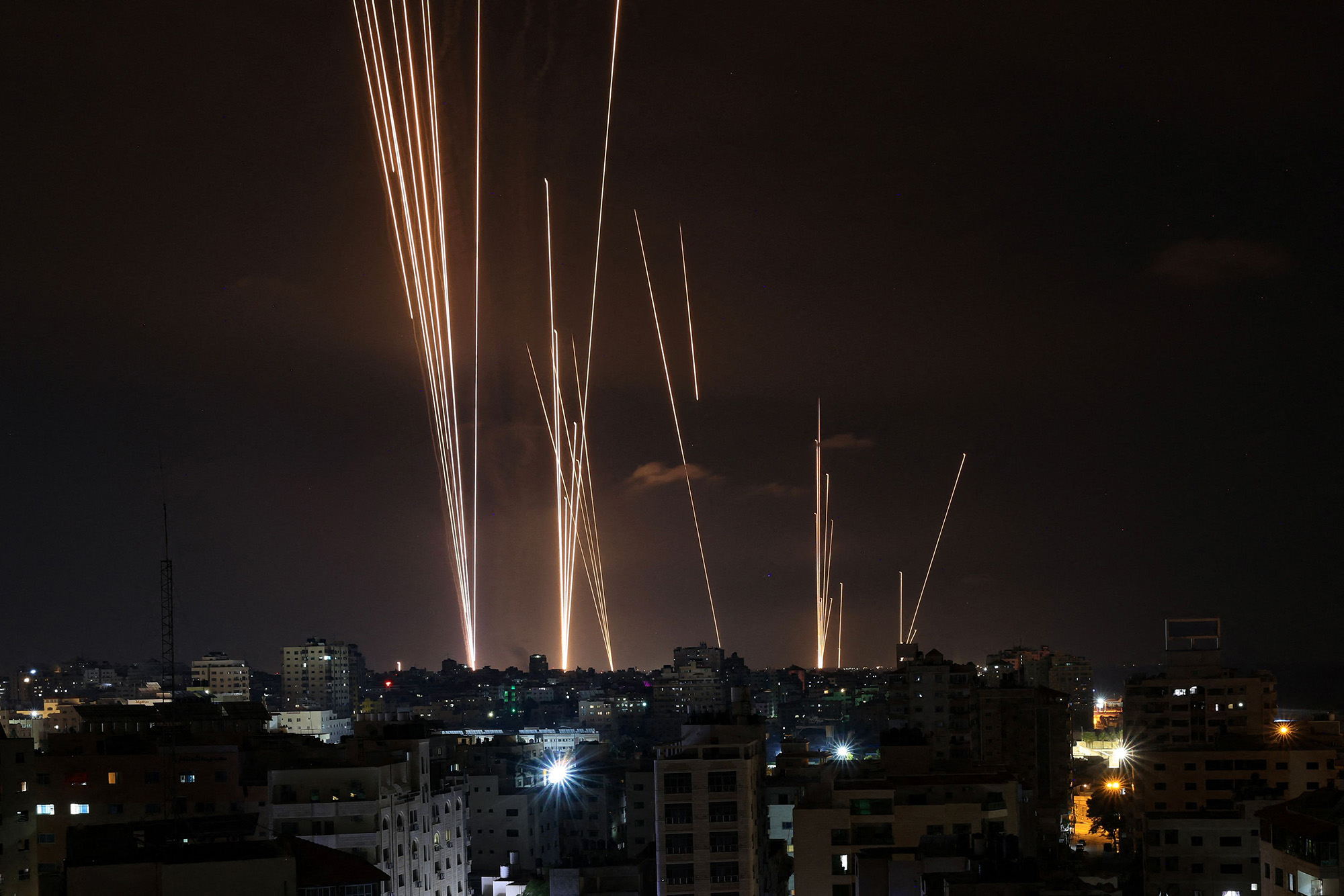 A salvo of rockets is fired from Gaza City toward Israel on October 7.