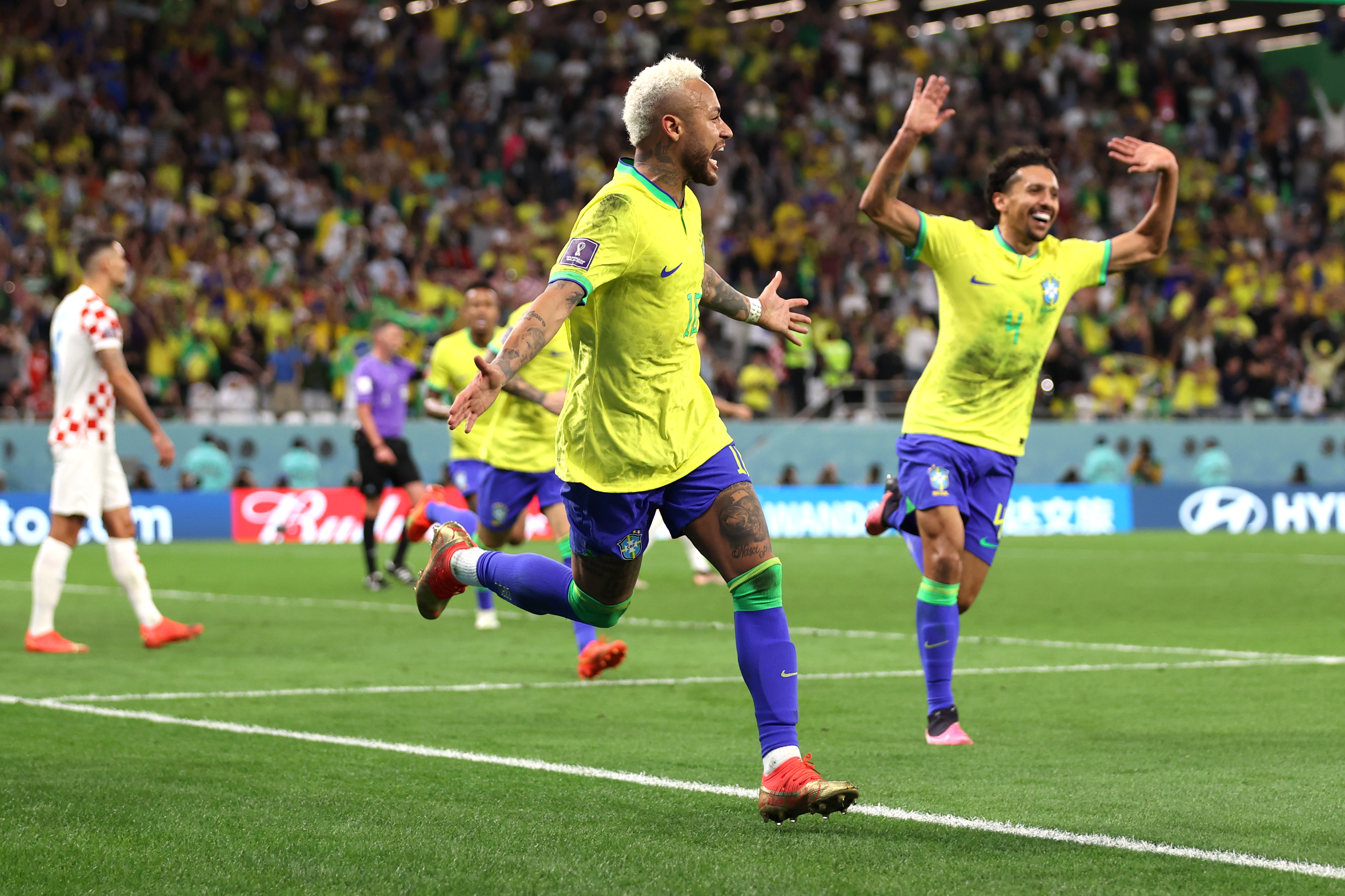 Neymar of Brazil celebrates after scoring the team's first goal during the quarter final match between Croatia and Brazil at Education City Stadium in Al Rayyan, Qatar on December 9.