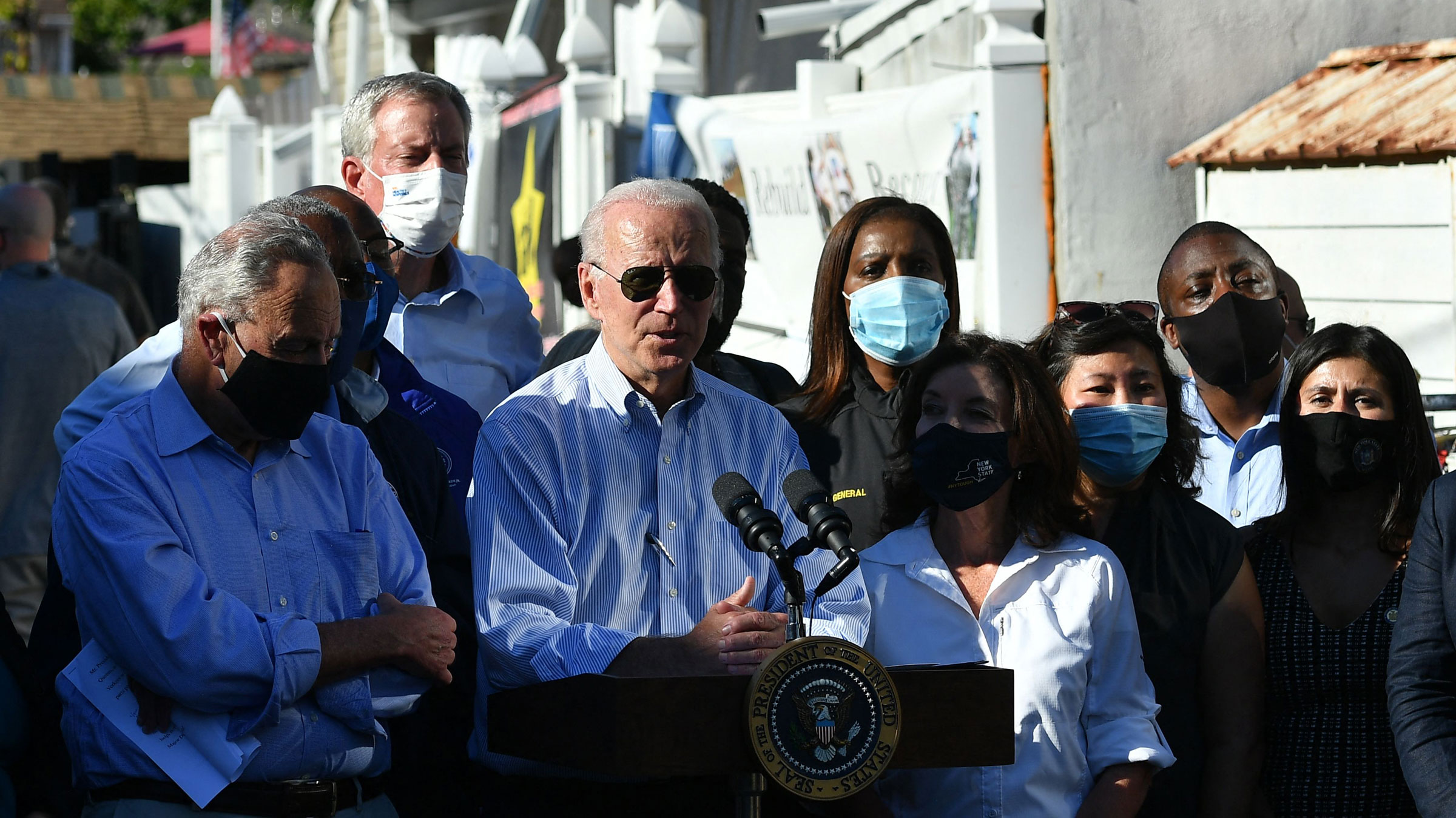 President Joe Biden speaks after touring a neighborhood in Queens, New York, on Tuesday.
