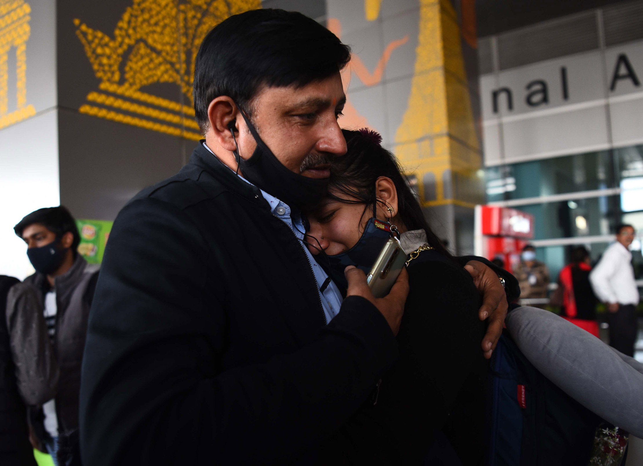 Indian students arrive from Ukraine at the Indira Gandhi International airpor in Delhi on Sunday.