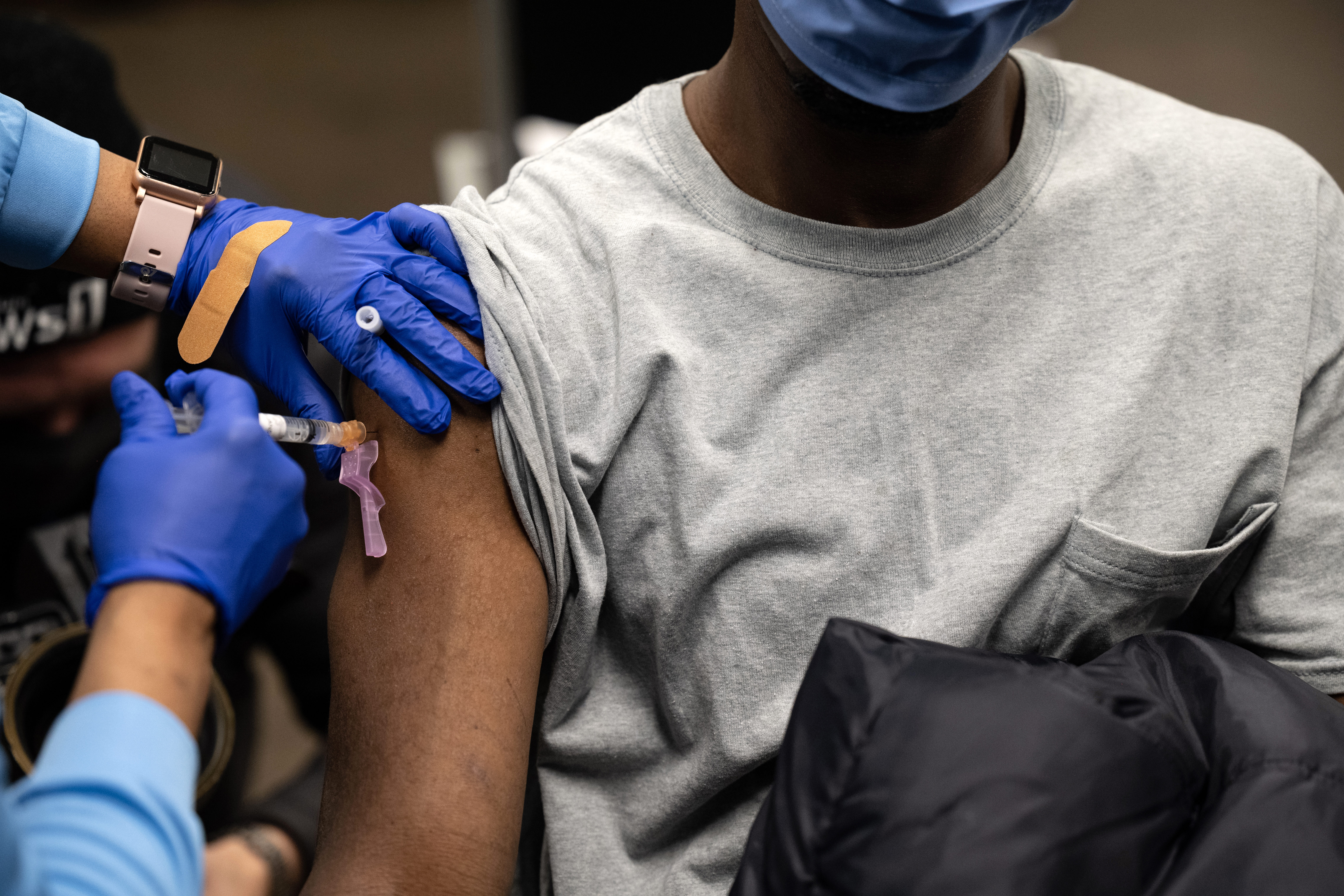 A nurse administers a Johnson & Jonson Covid-19 vaccine on March 15, in Louisville, Kentucky. 