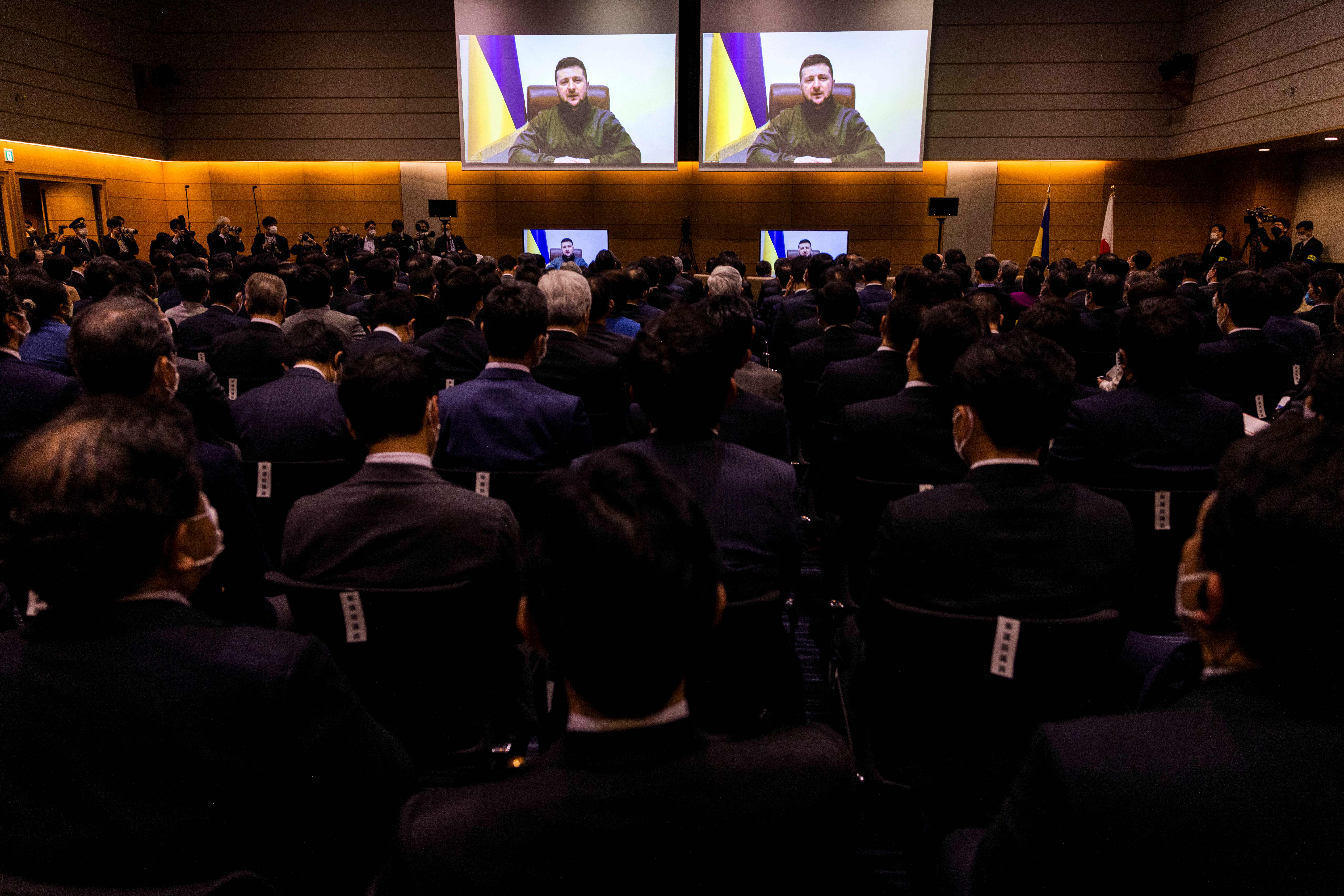 Ukrainian President Volodymyr Zelensky speaks to members of Japan's lower house of parliament via a video link at the House of Representatives office building in Tokyo, Japan, on March 23. 