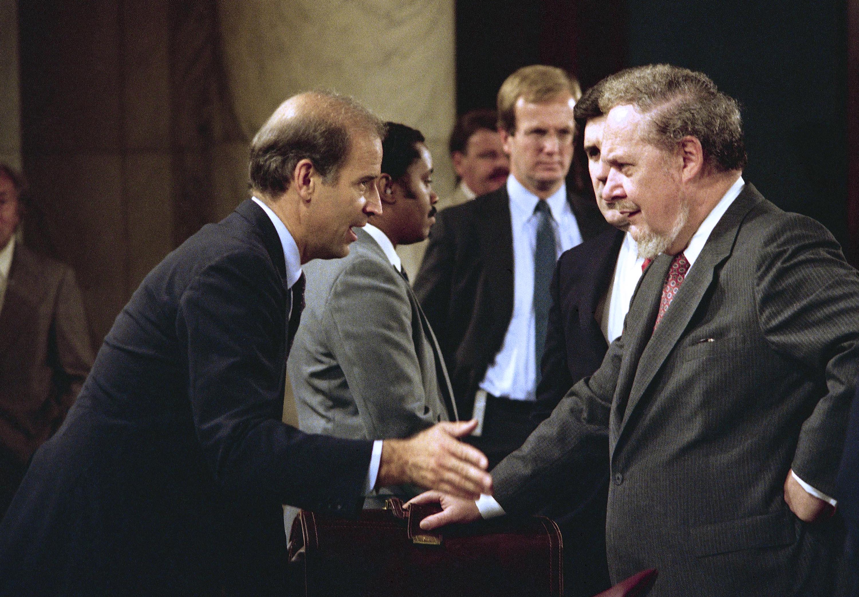 Then-Sen. Joseph Biden, chairman of the Senate Judiciary Committee, left, greets Judge Robert Bork prior to a hearing of the committee on Capitol Hill in September 1987. The committee was holding hearings on the nomination of Bork to become a Supreme Court Justice. 
