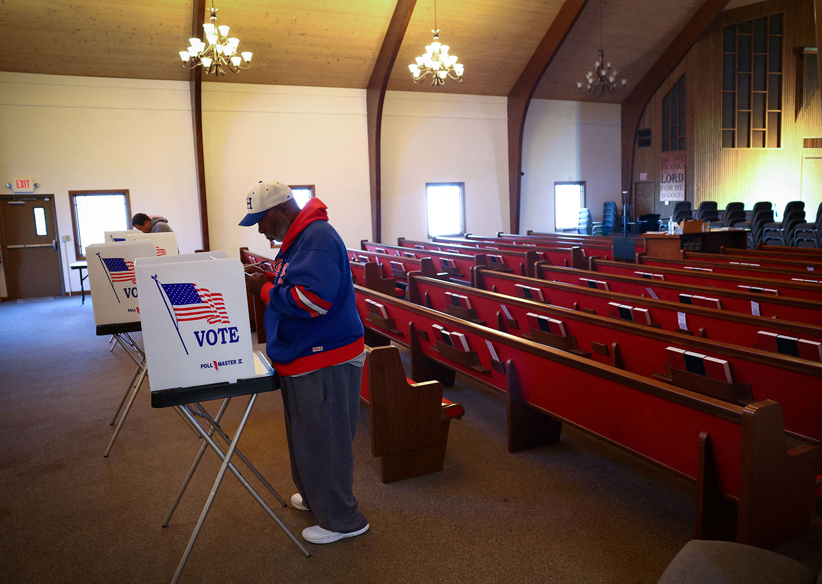 Alex Erby fills out his ballot while voting at a polling station in Harrisburg, Pennsylvania, on November 8. 