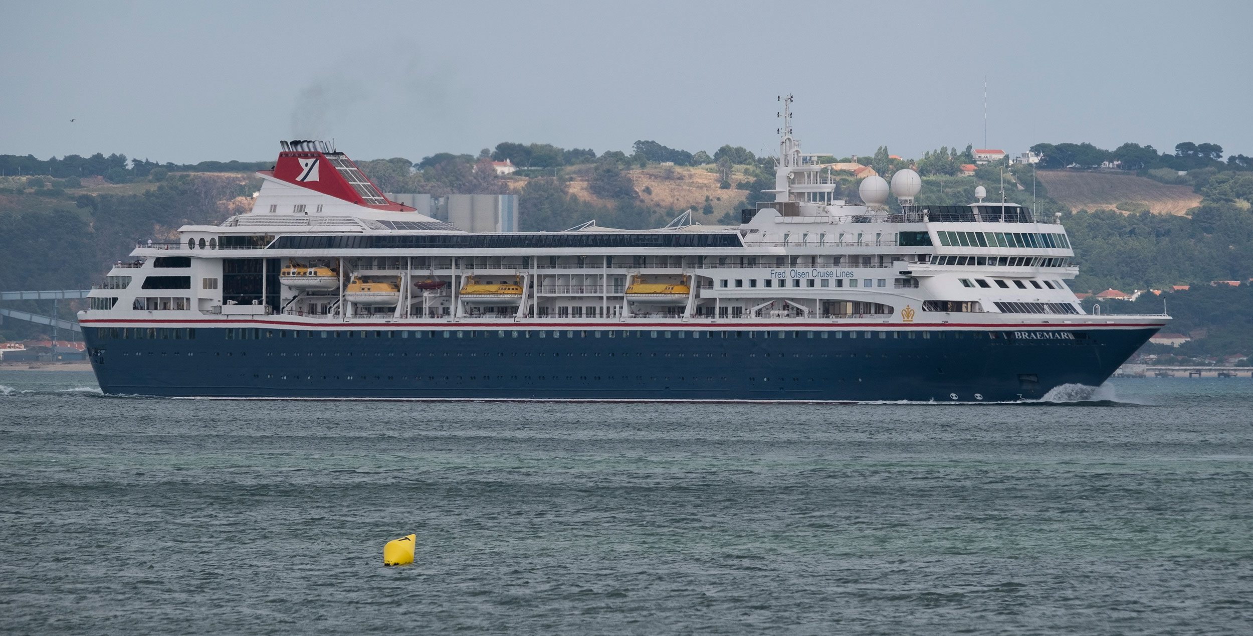 Cruise ship MS Braemar operated by Fred Olsen Cruise Lines leaves harbor in Lisbon, Portugal, on July 19, 2018.