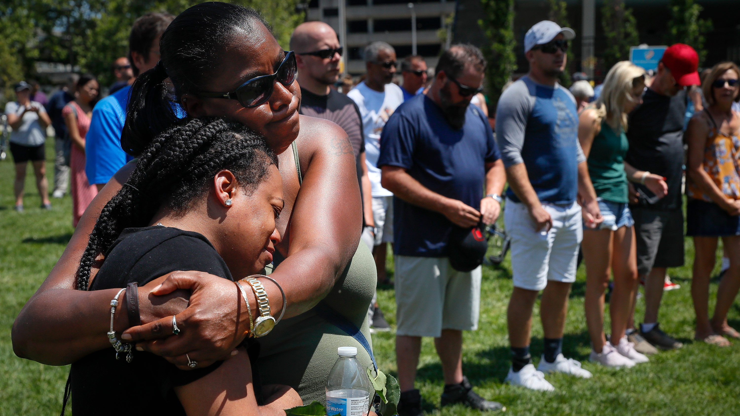 Mourners gather at a vigil following a mass shooting in Dayton, Ohio. 