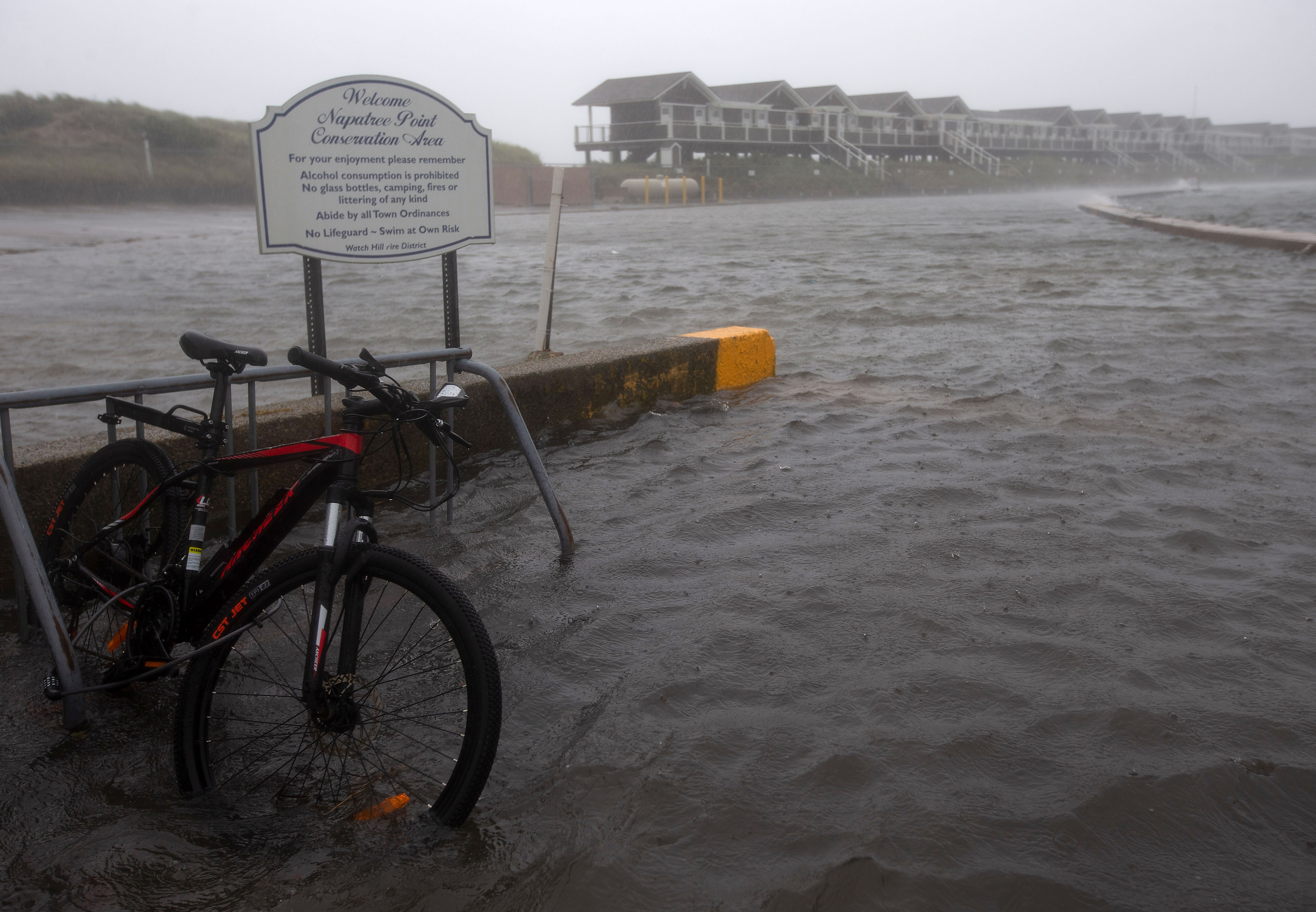 A bicycle sits in floodwaters in Westerly, Rhode Island, on August 22, 2021.