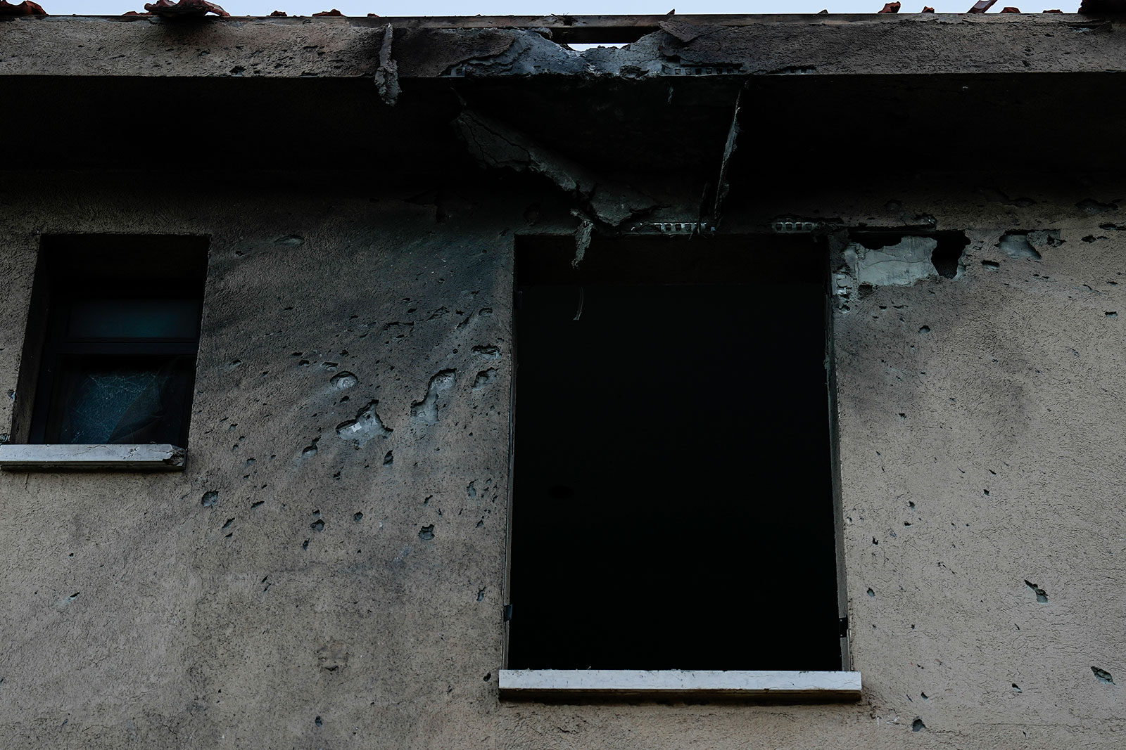 Damage to a house in Kiryat Shmona, Israel is seen from a rocket fired by Lebanon's Hezbollah militant group on Tuesday.