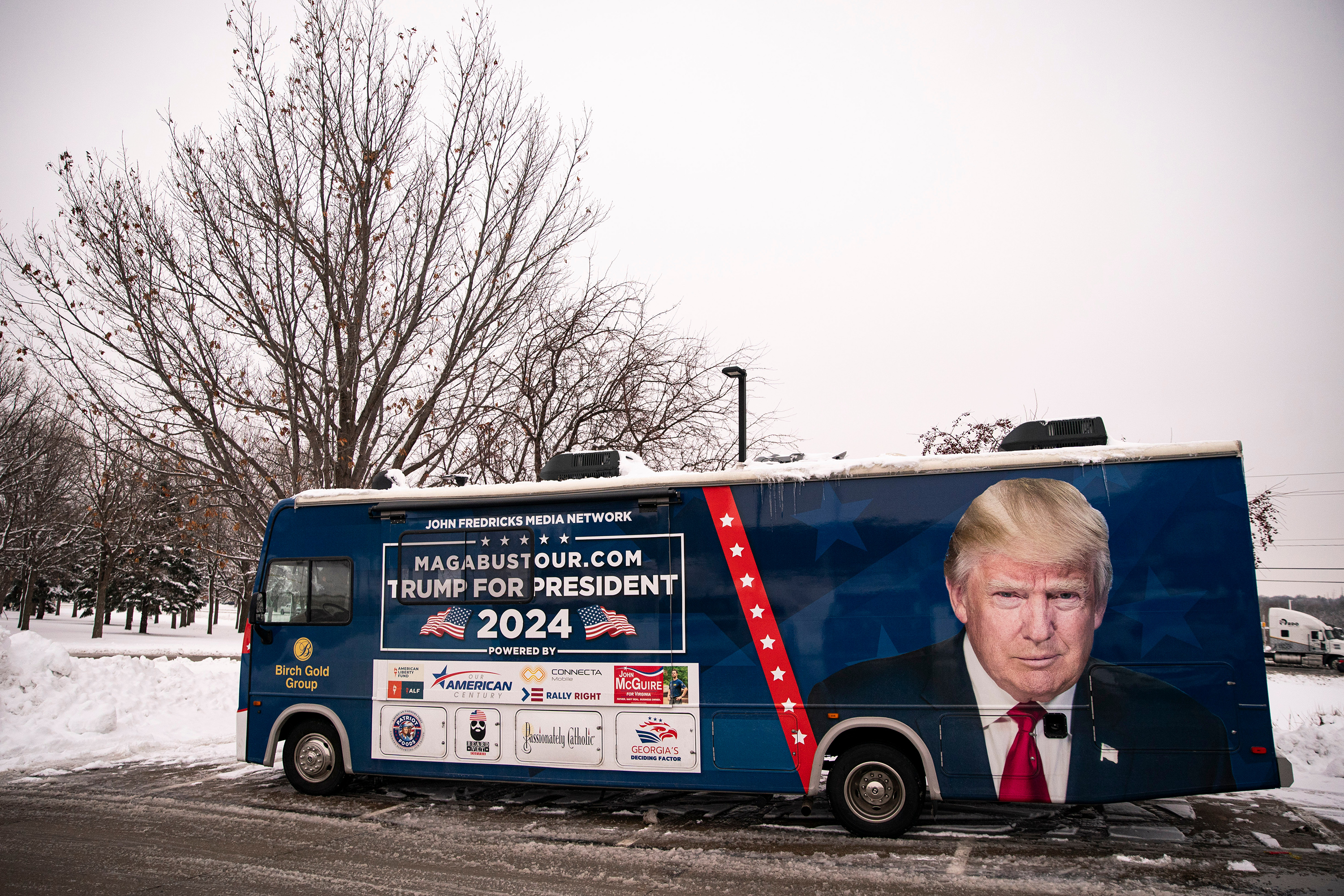 A bus supporting former US President Donald Trump outside of the Machine Shed in Urbandale, Iowa, on January 11.