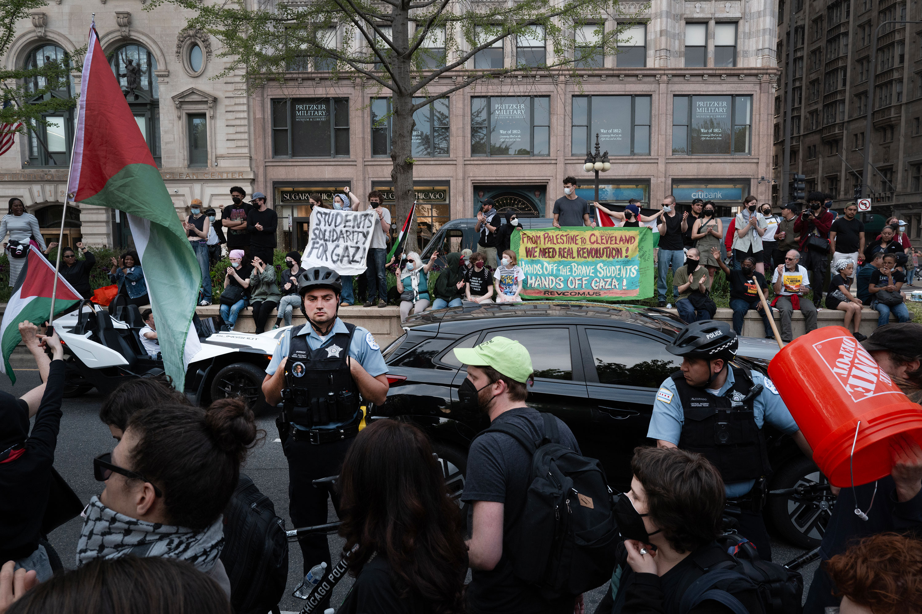 Police stand outside of the Art Institute of Chicago on May 4 after students established a protest encampment on the grounds. 