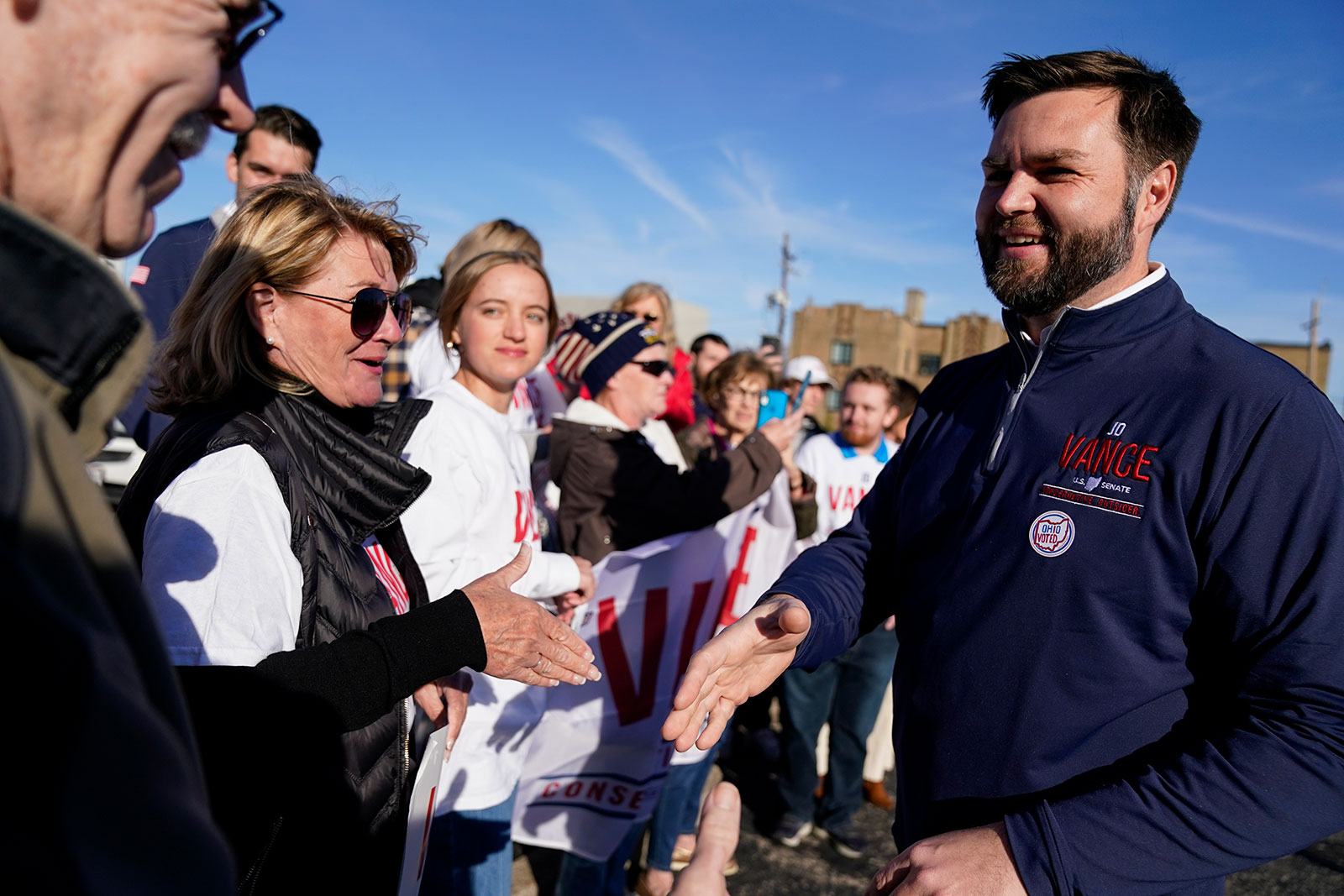 J.D. Vance meets with supporters after casting his ballot at a polling location in Cincinnati on Tuesday. 