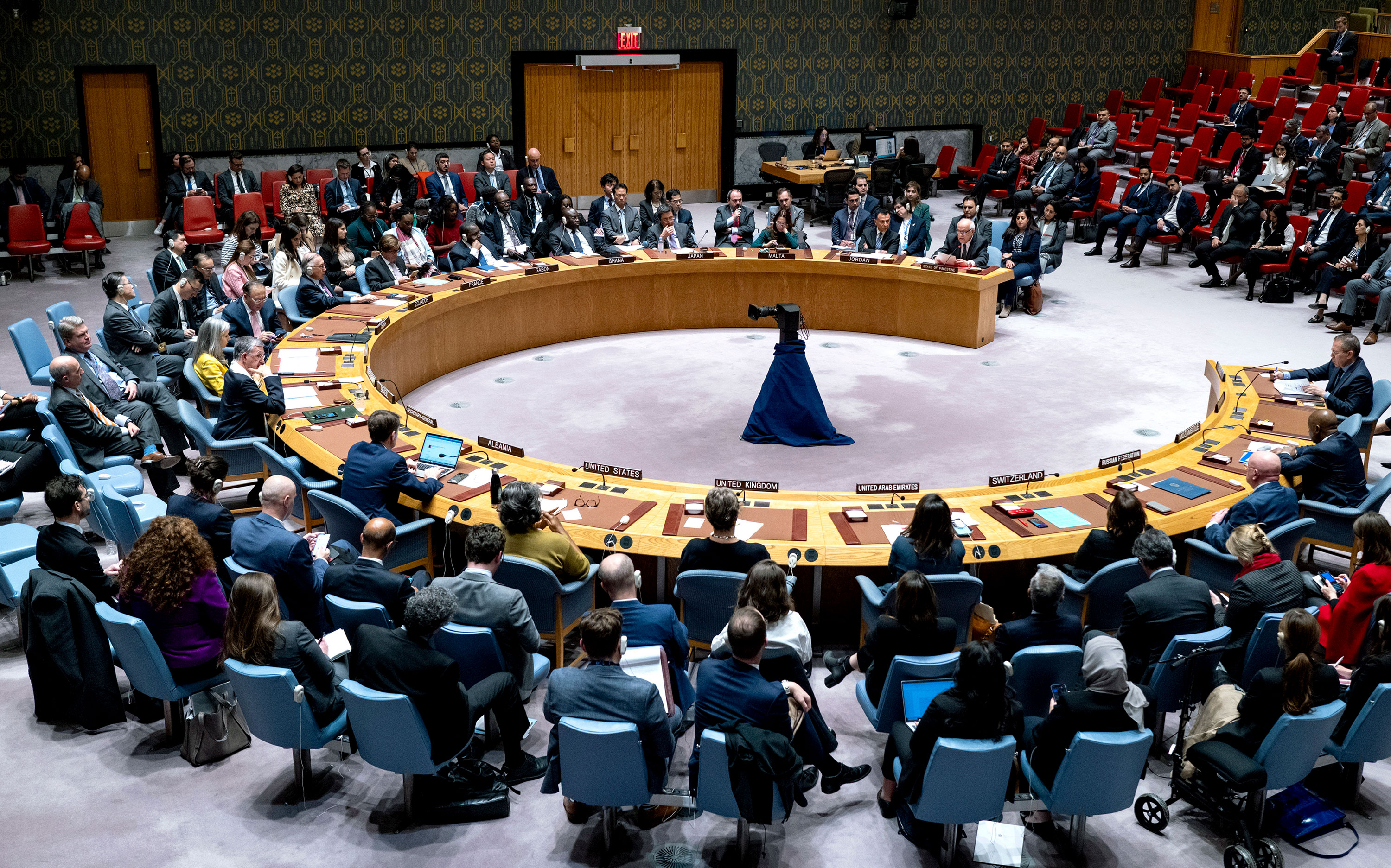 Palestinian U.N. ambassador Riyad Mansour, background right, addresses members of the U.N. Security Council at United Nations headquarters on October 16, 2023.