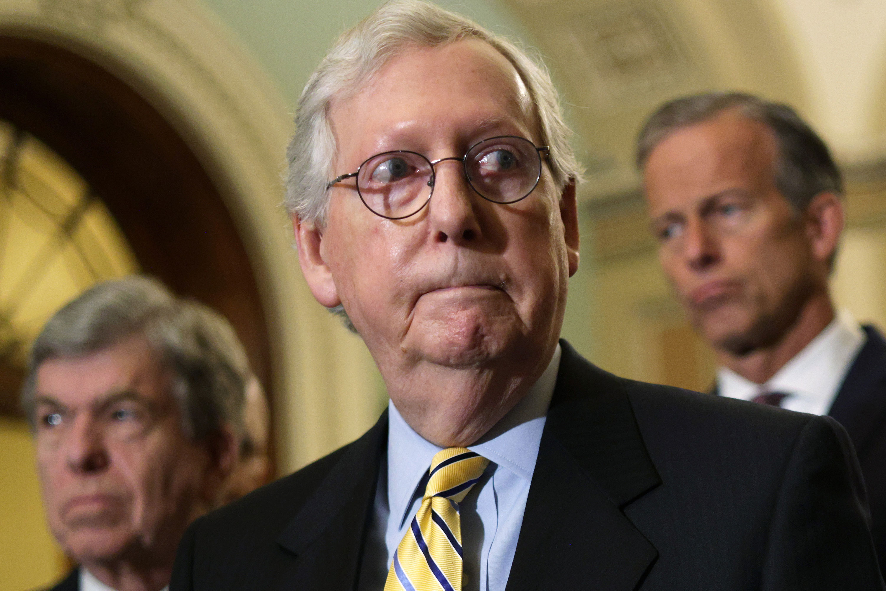 Sen. Mitch McConnell is seen during a news briefing at the Capitol in Washington in June.