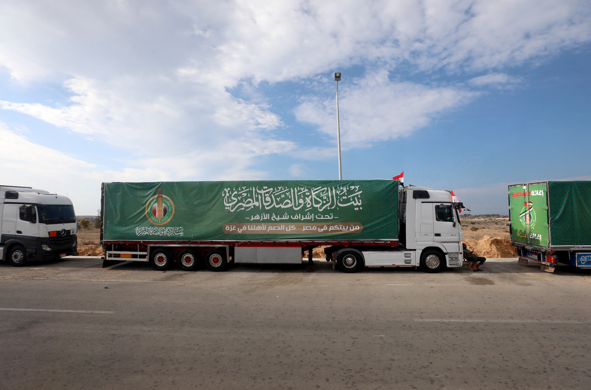 Trucks carrying humanitarian aid for Palestinians in Rafah, Egypt, on Tuesday.