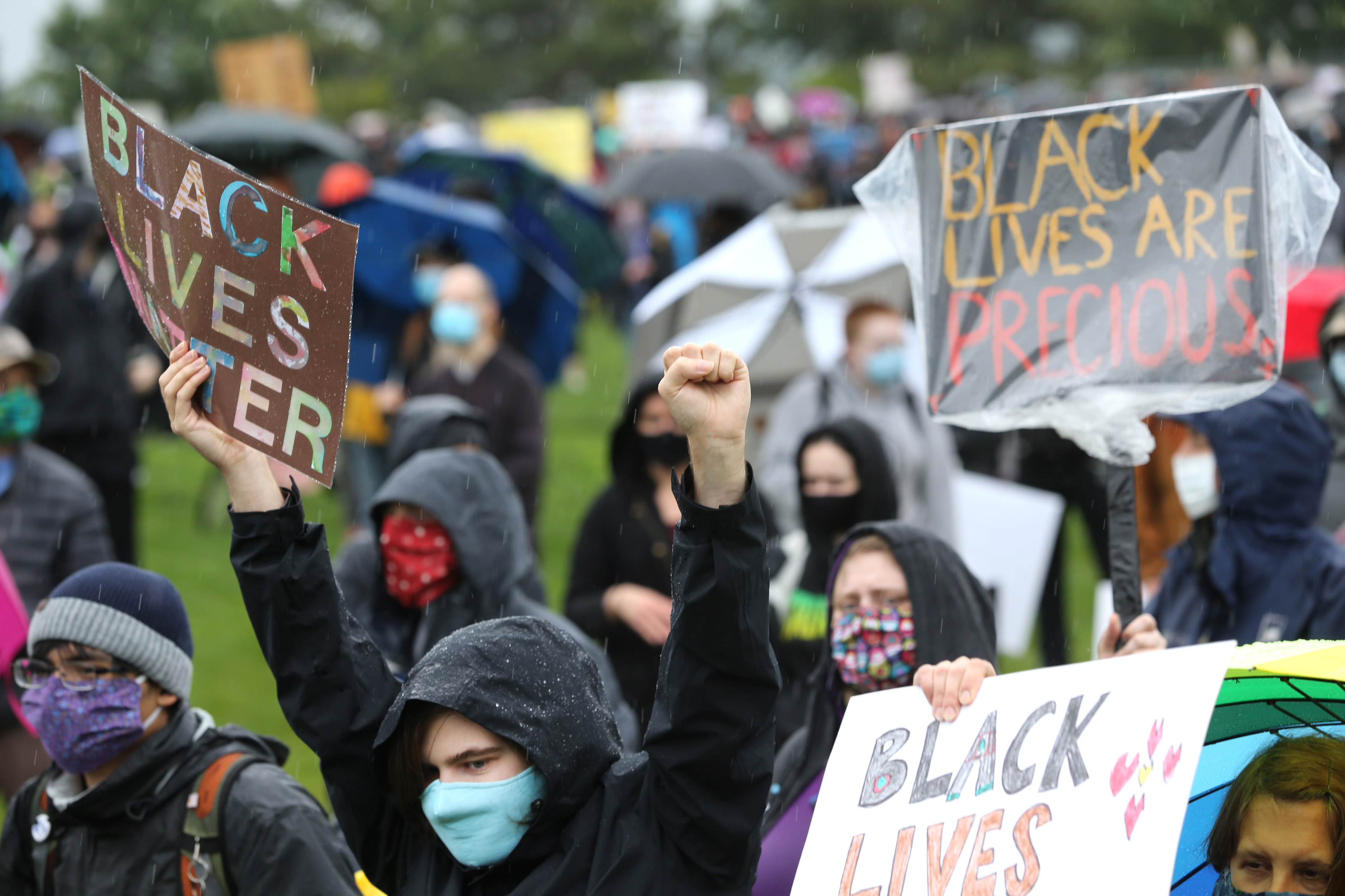 Demonstrators walk during a Black Lives Matter of Seattle-King County silent march on June 12 in Seattle, Washington.