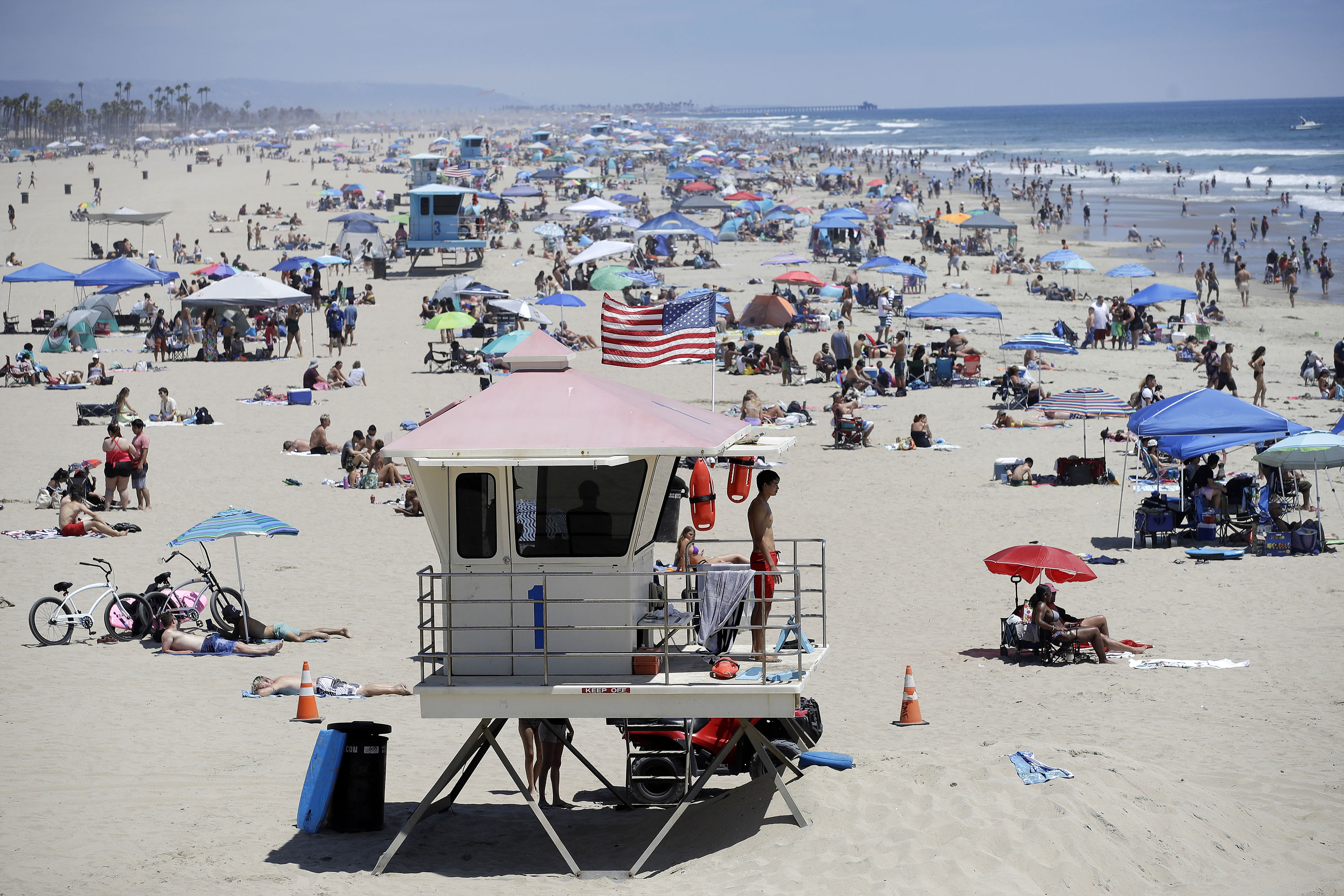 A lifeguard keeps watch in Huntington Beach, California, on June 27.