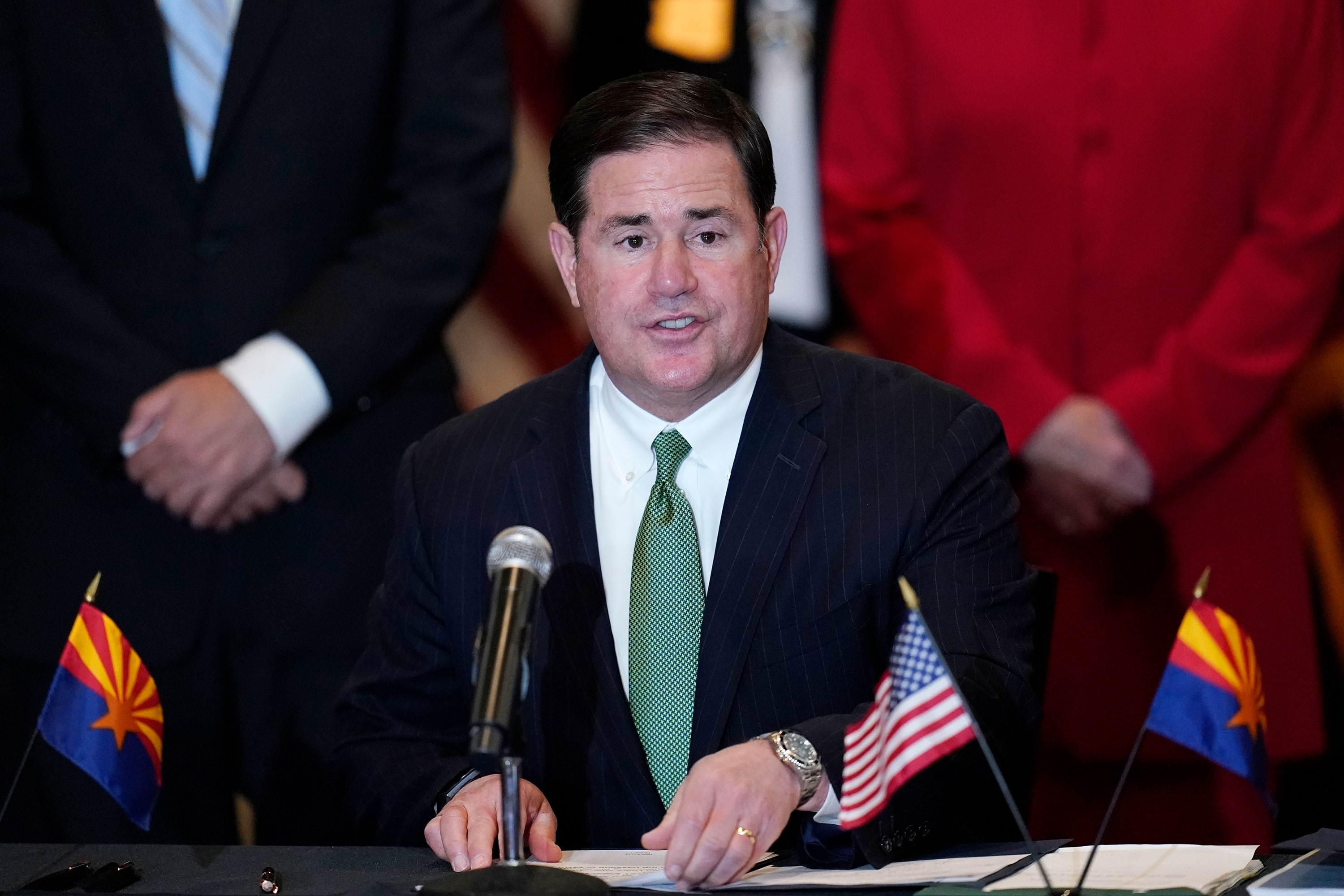Arizona Gov. Doug Ducey speaks during a bill signing in April.