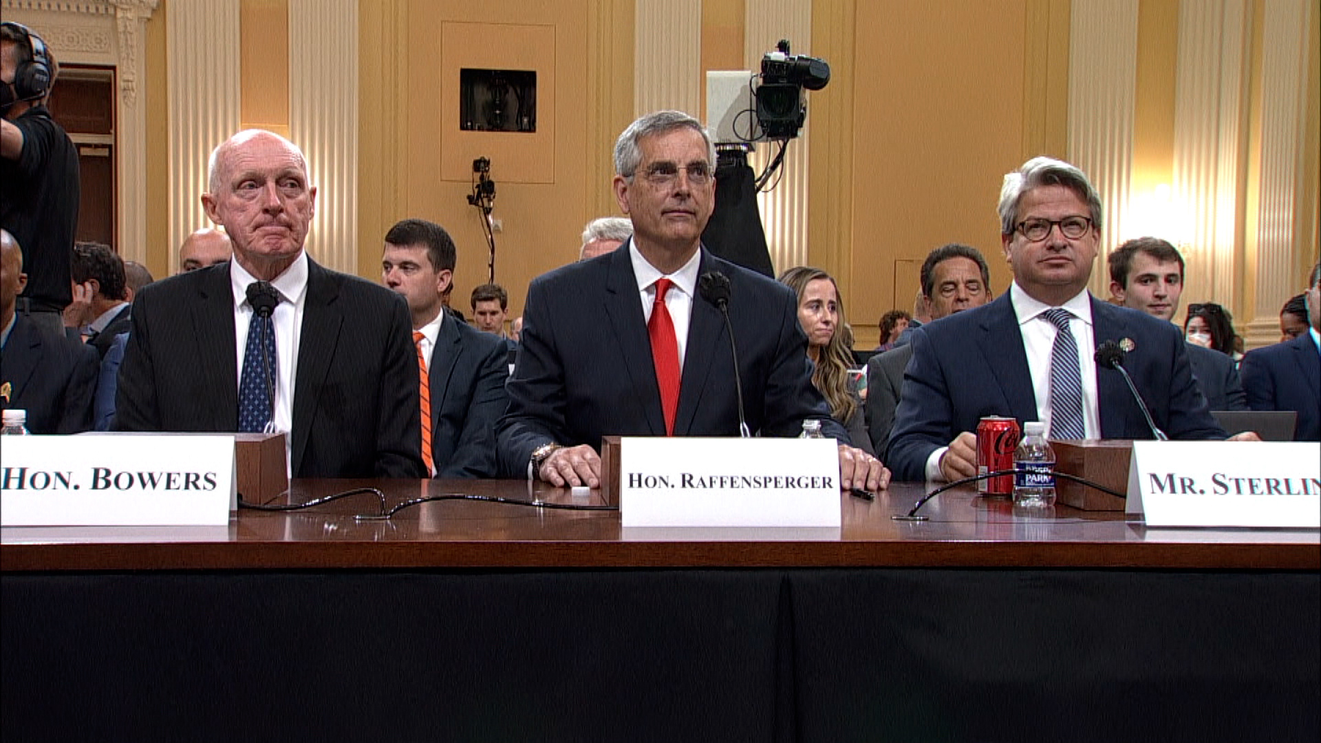 Three witnesses are seated before Tuesday's hearing. From left are Arizona House Speaker Rusty Bowers, Georgia Secretary of State Brad Raffensperger and Raffensperger's chief operating officer Gabe Sterling.