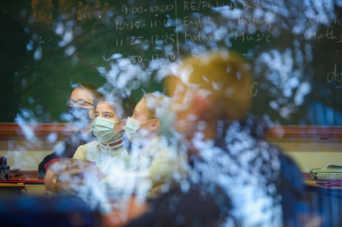 Sixth grade students at the Max Planck School in Kiel, Germany sit in their classroom during their first lesson after the autumn holidays on October 19.