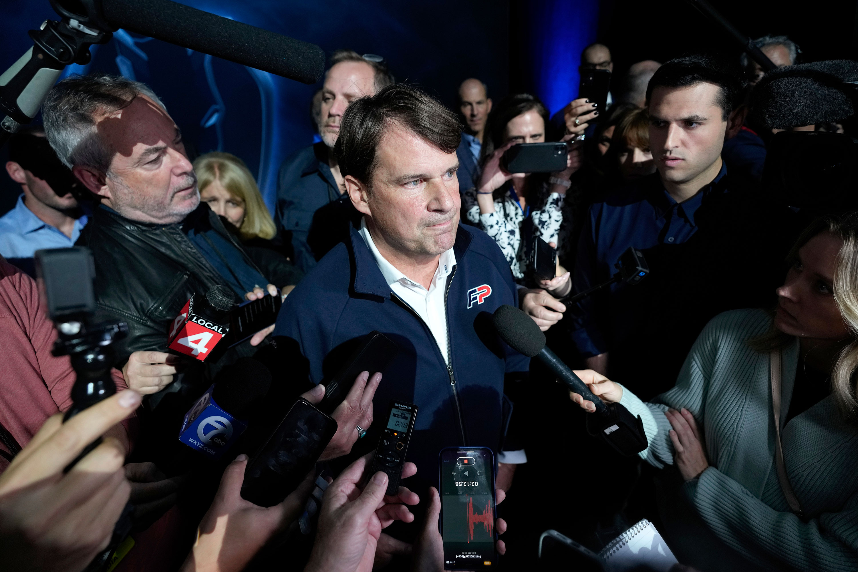 Ford CEO Jim Farley speaks to reporters about the UAW contract talks at the North American International Auto Show in Detroit on September 13. 