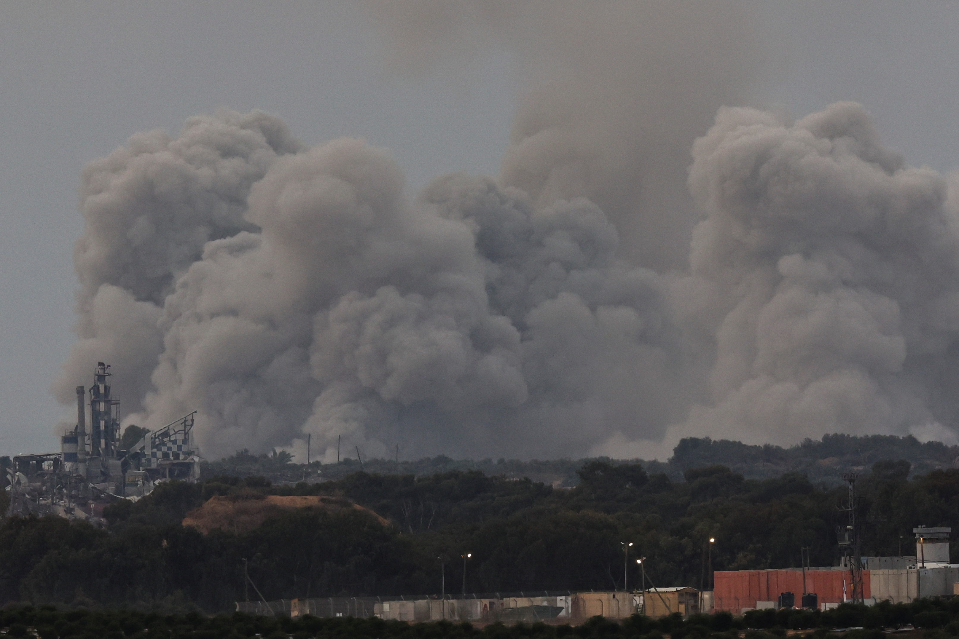 Smoke rises over Gaza, as seen from southern Israel on Thursday.