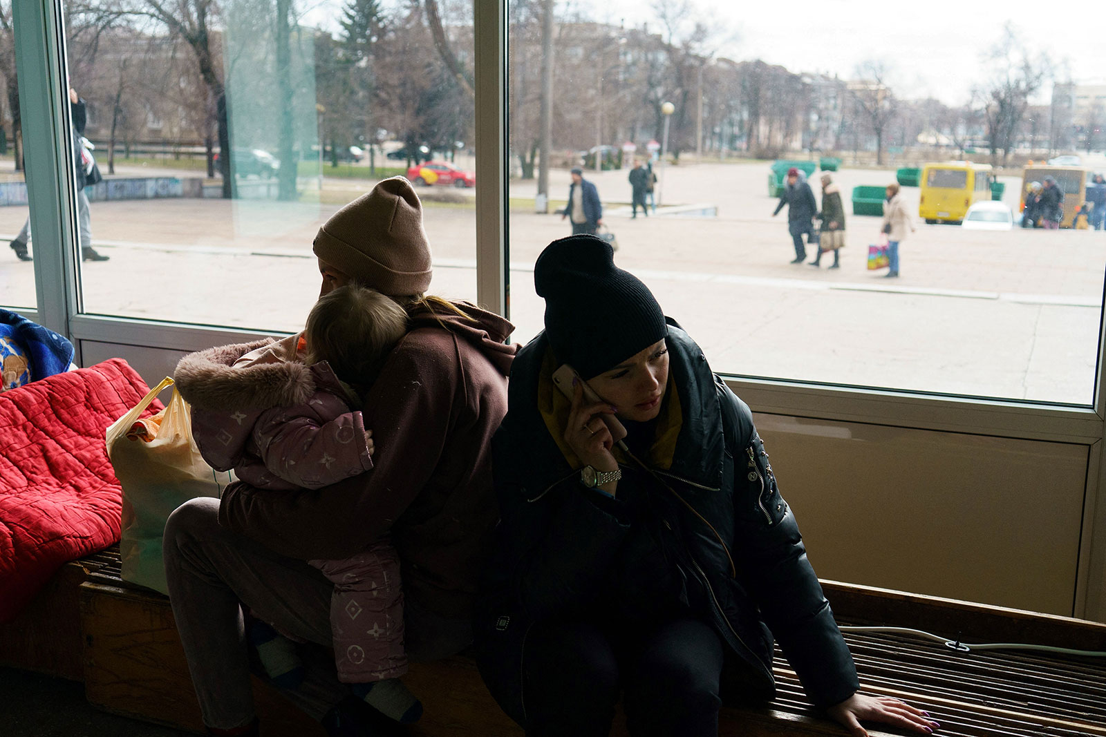 Evacuees from Mariupol wait at the Zaporizhzhia State Circus to be transported to other locations in the city on March 16.