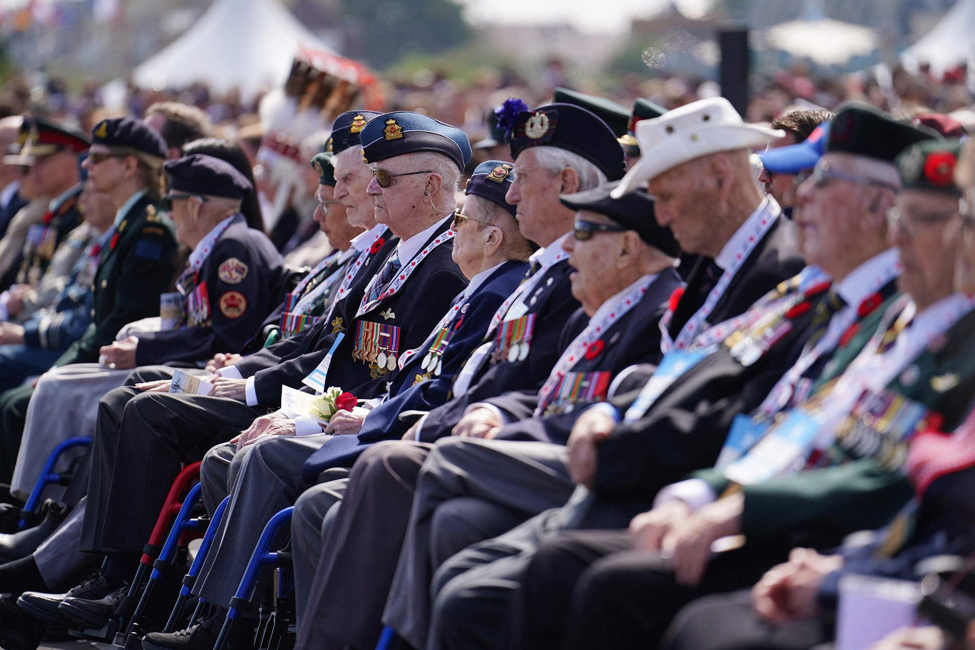 Veterans attend the Canadian commemorative ceremony at the British Normandy Memorial at the Juno Beach Centre, Courseulles-sur-Mer, France, on June 6.