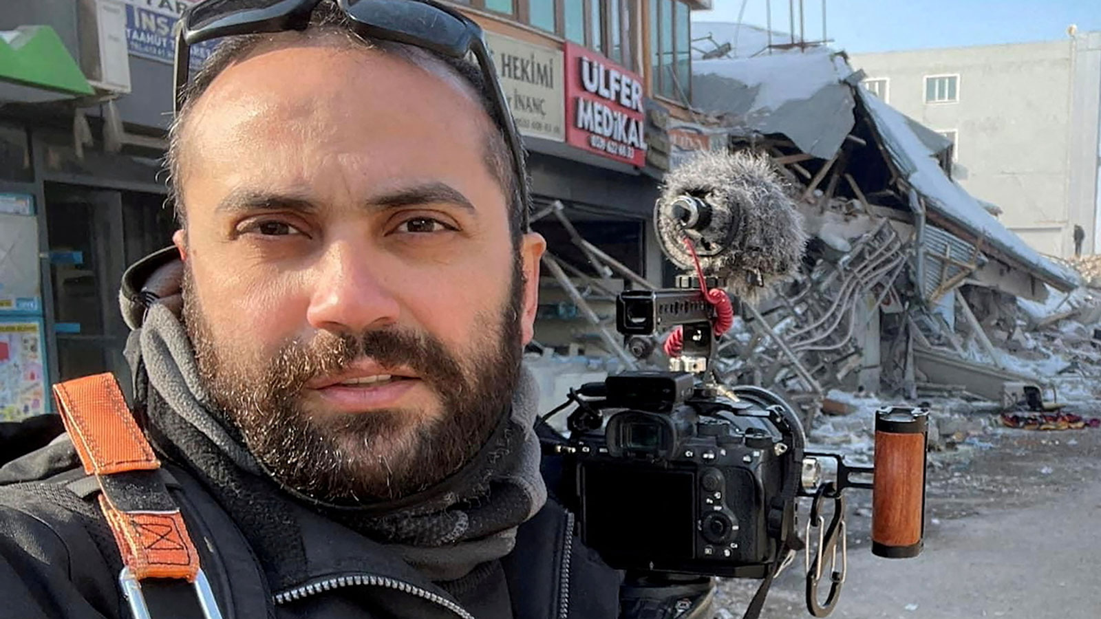 Reuters' journalist Issam Abdallah takes a selfie picture while working in Maras, Turkey, on February 11. Abdallah was killed in southern Lebanon on Friday, according to a statement from the news agency.