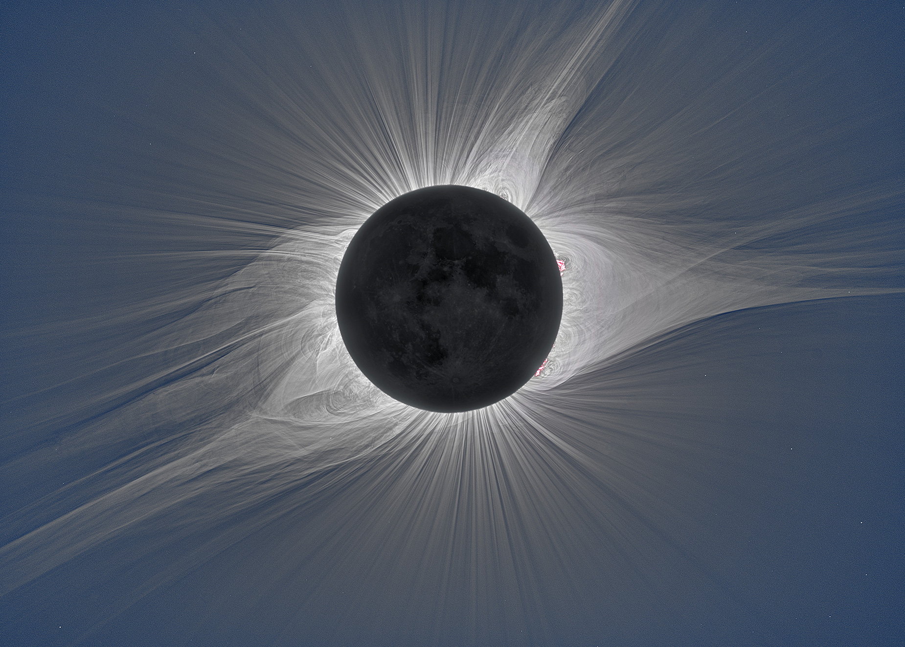 The solar corona glows in visible white light during the total solar eclipse over Mitchell, Oregon, on August 21, 2017, from an image taken during an experiment.