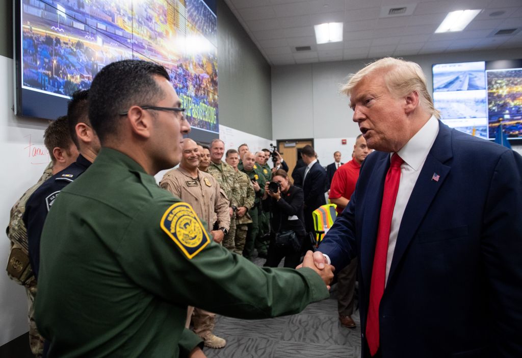 President Trump greets first responders as he visits El Paso Regional Communications Center in El Paso, Texas, Aug. 7, 2019, following last weekend's mass shootings. 
