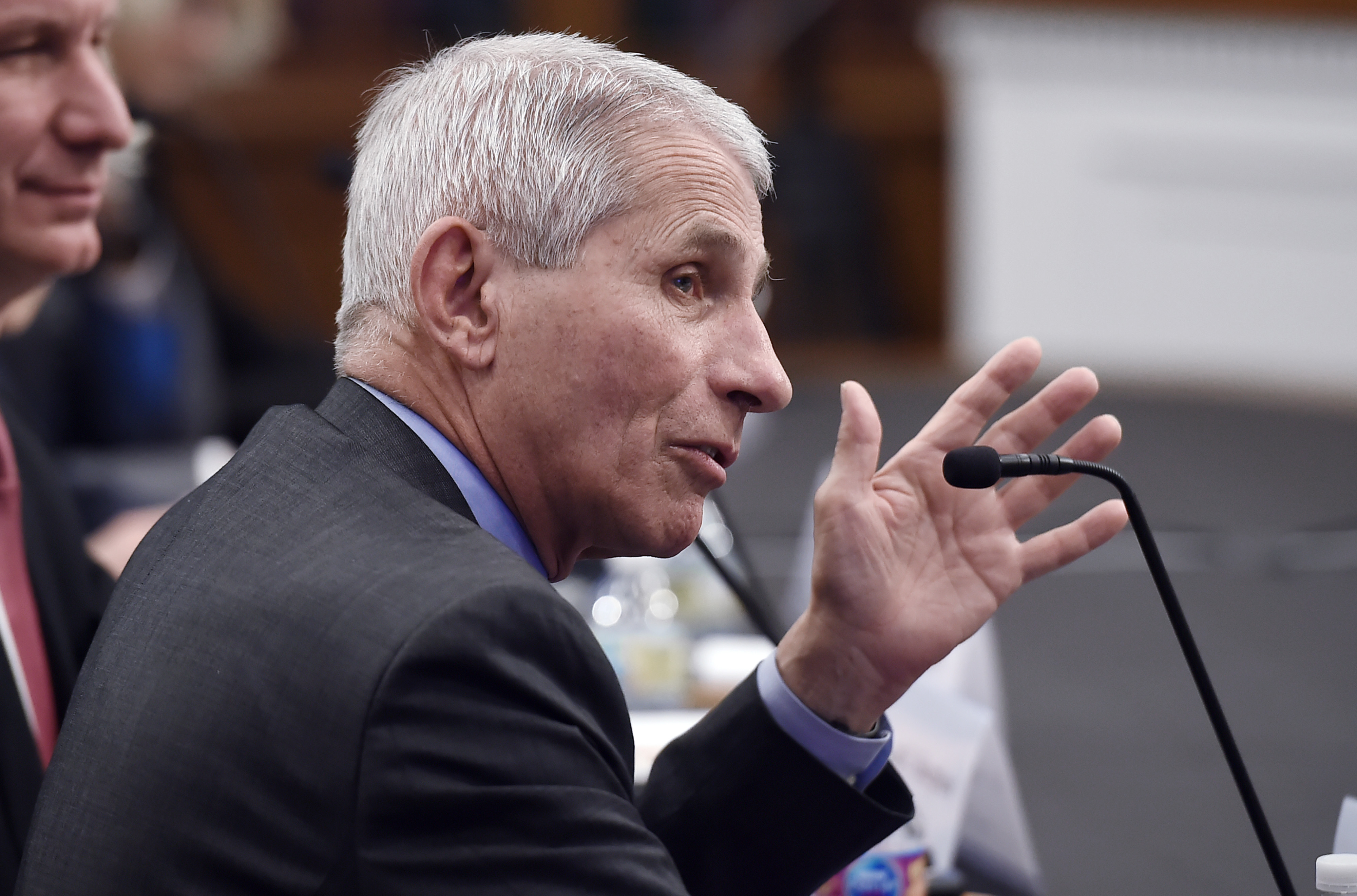 Dr. Anthony Fauci, right, testifies before a House appropriations subcommittees hearing on Wednesday, March 4.