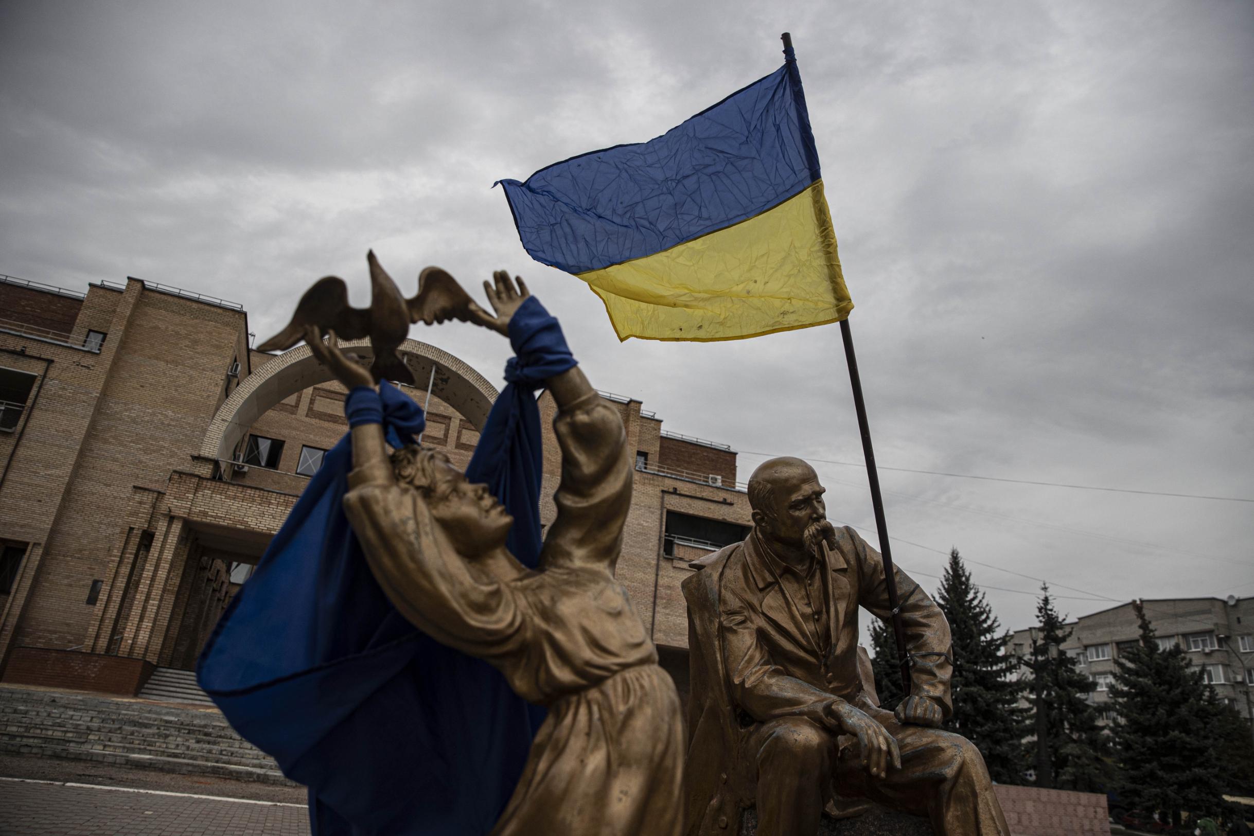 The Ukrainian flag waves after the Ukrainian army liberated the town of Balakliya, on Sunday.
