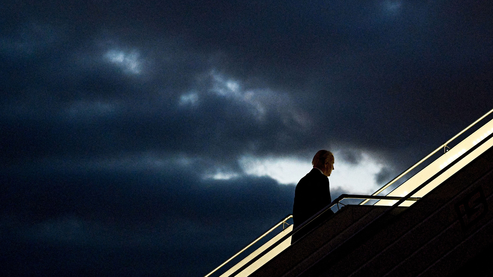 US President Joe Biden boards Air Force One before departing Warsaw Chopin Airport in Warsaw on February 22.
