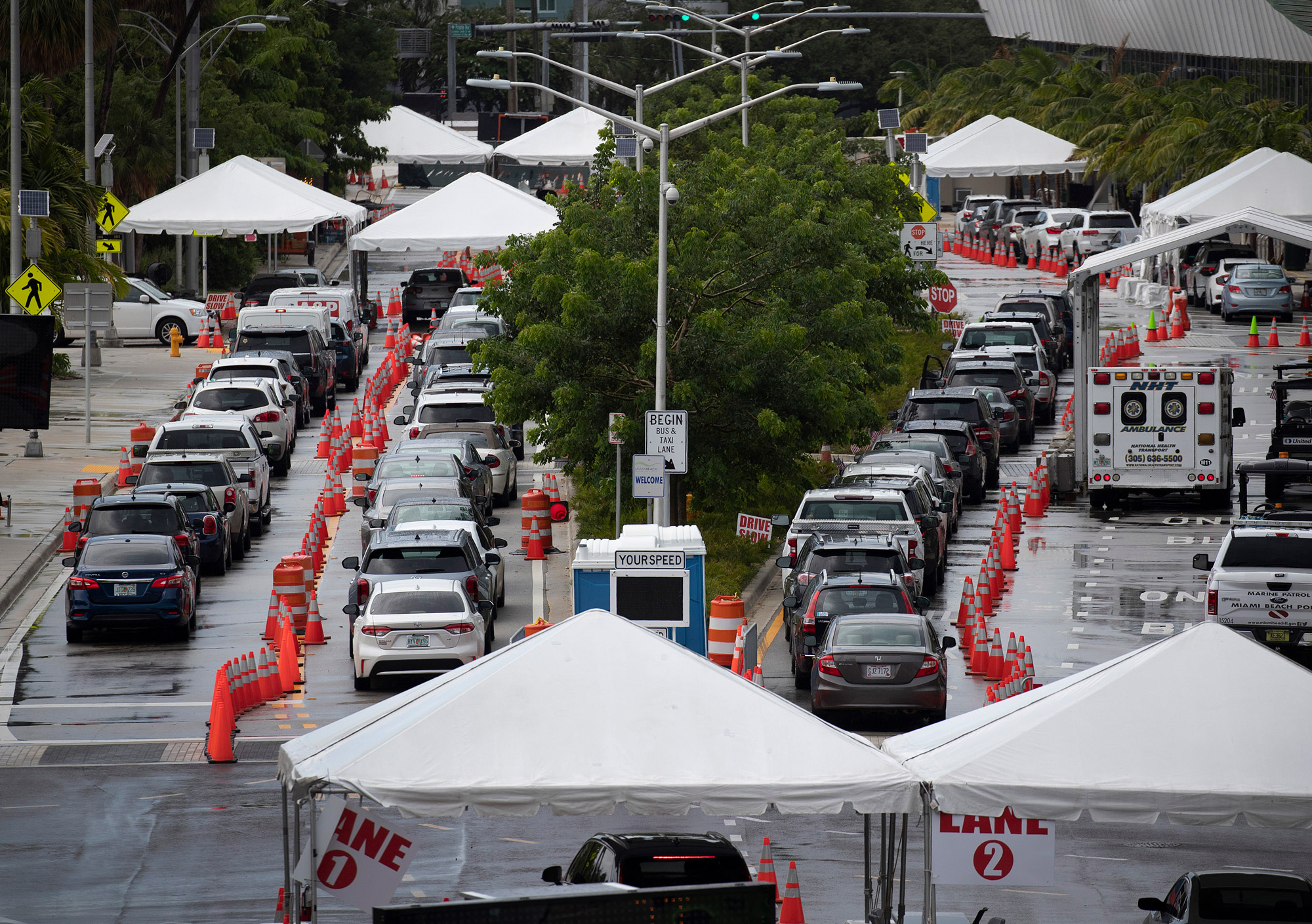 Cars are seen in line as the drivers wait to be tested for COVID-19 at the COVID test site located at the Miami Beach Convention Center on July 13 in Miami Beach, Florida. 