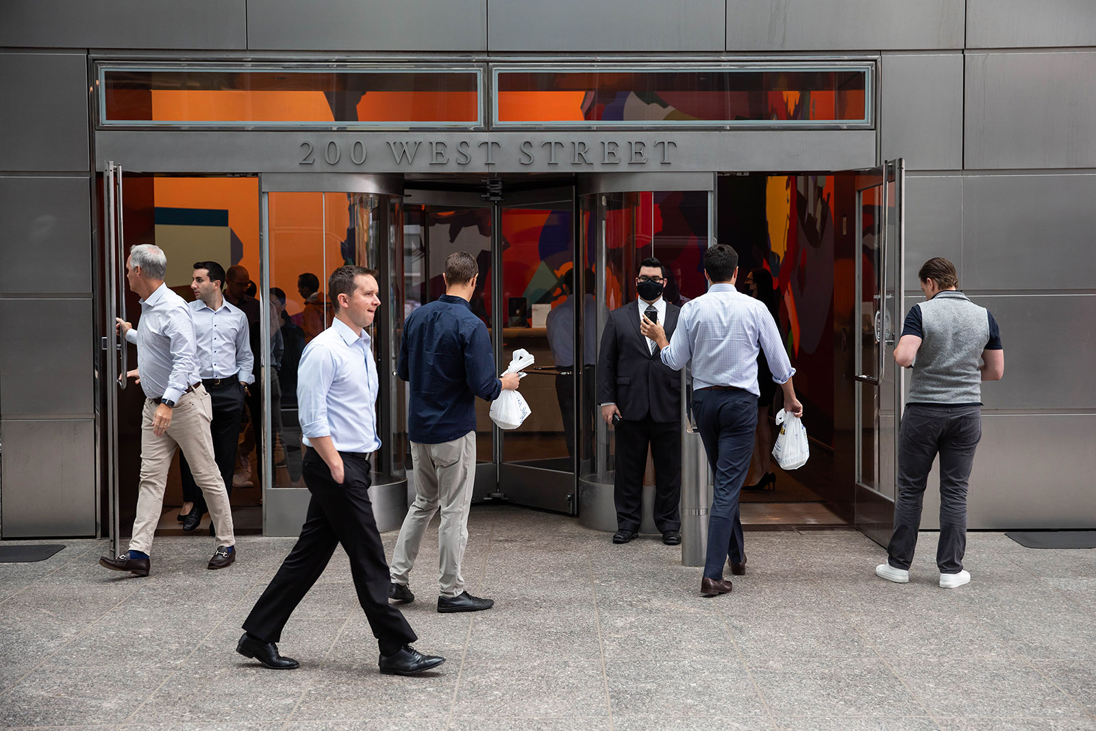 People enter the Goldman Sachs headquarters New York in June.