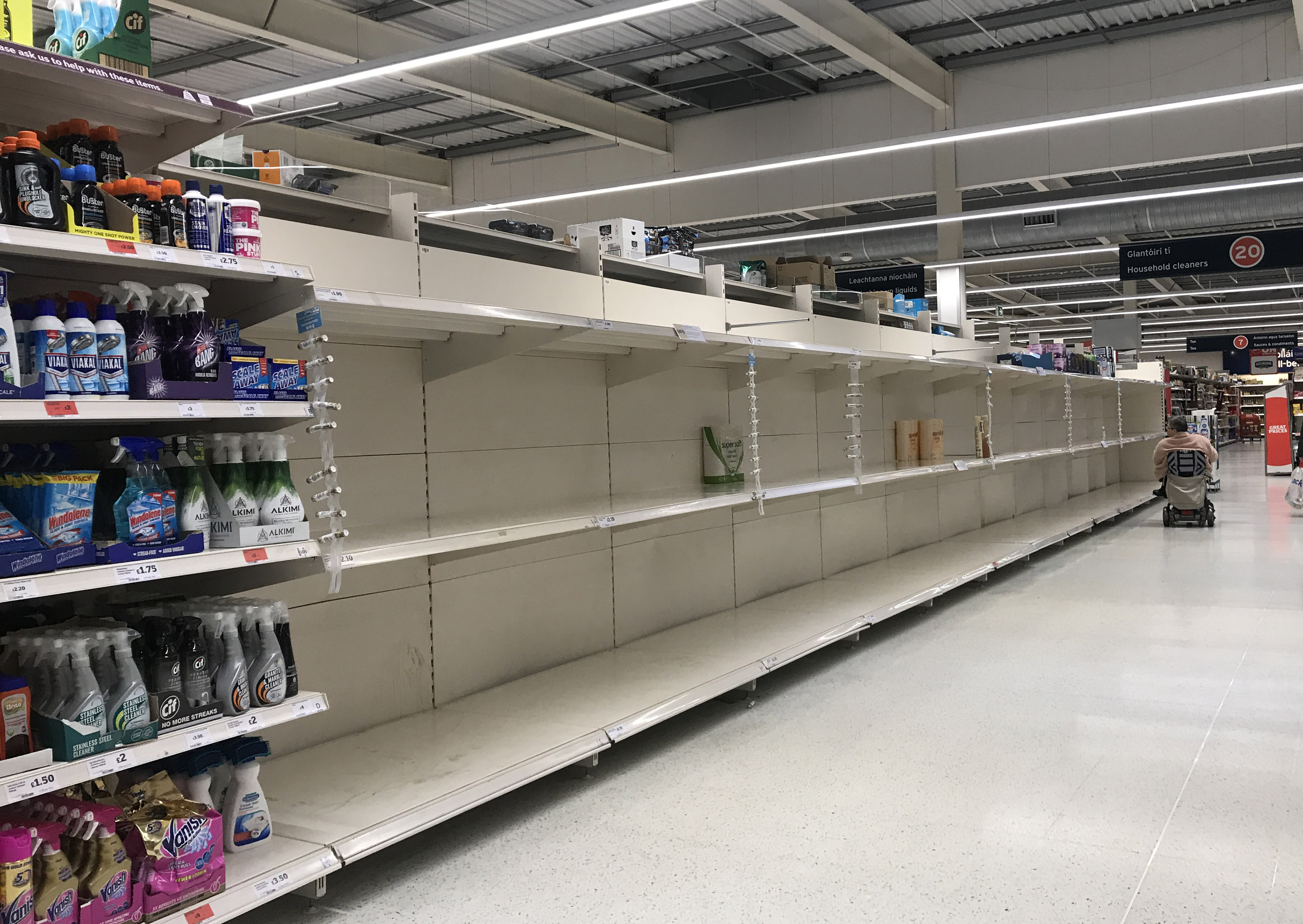 A Sainsbury's supermarket in B is pictured with empty shelves where hand wash and sanitizers would normally be on display.