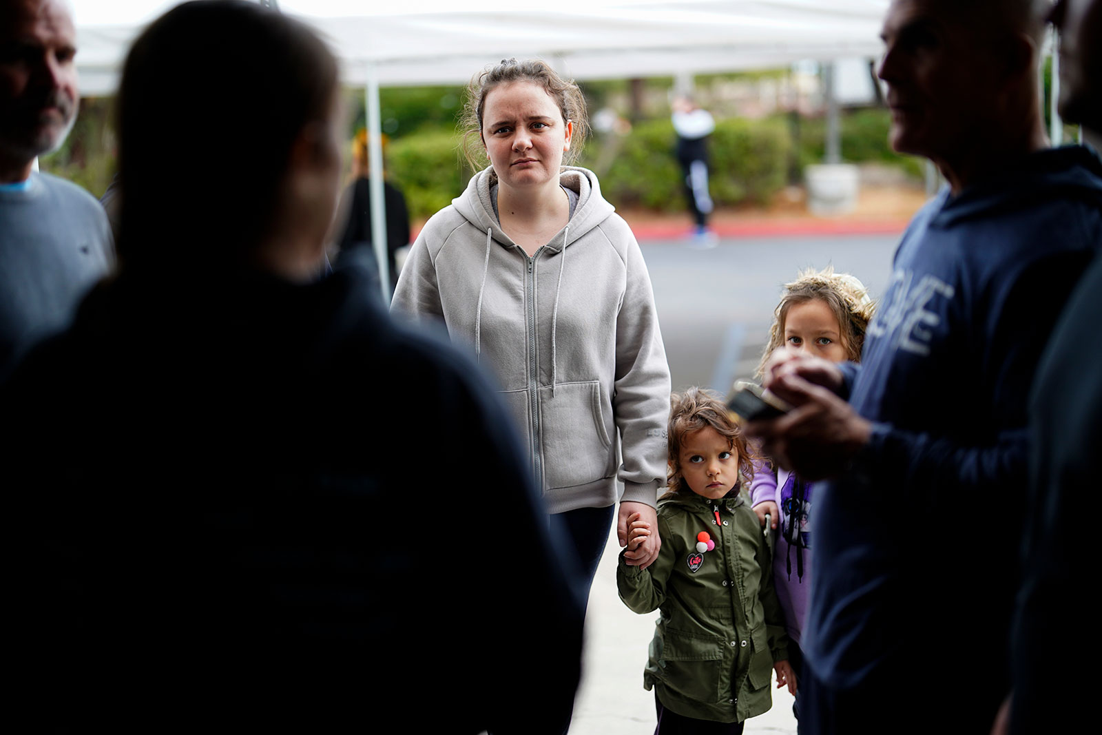 A Ukrainian family arrives at a shelter at the Christian church, Calvary San Diego, in Chula Vista, California, after crossing into the US from Tijuana, Mexico, on Friday, April 1. 