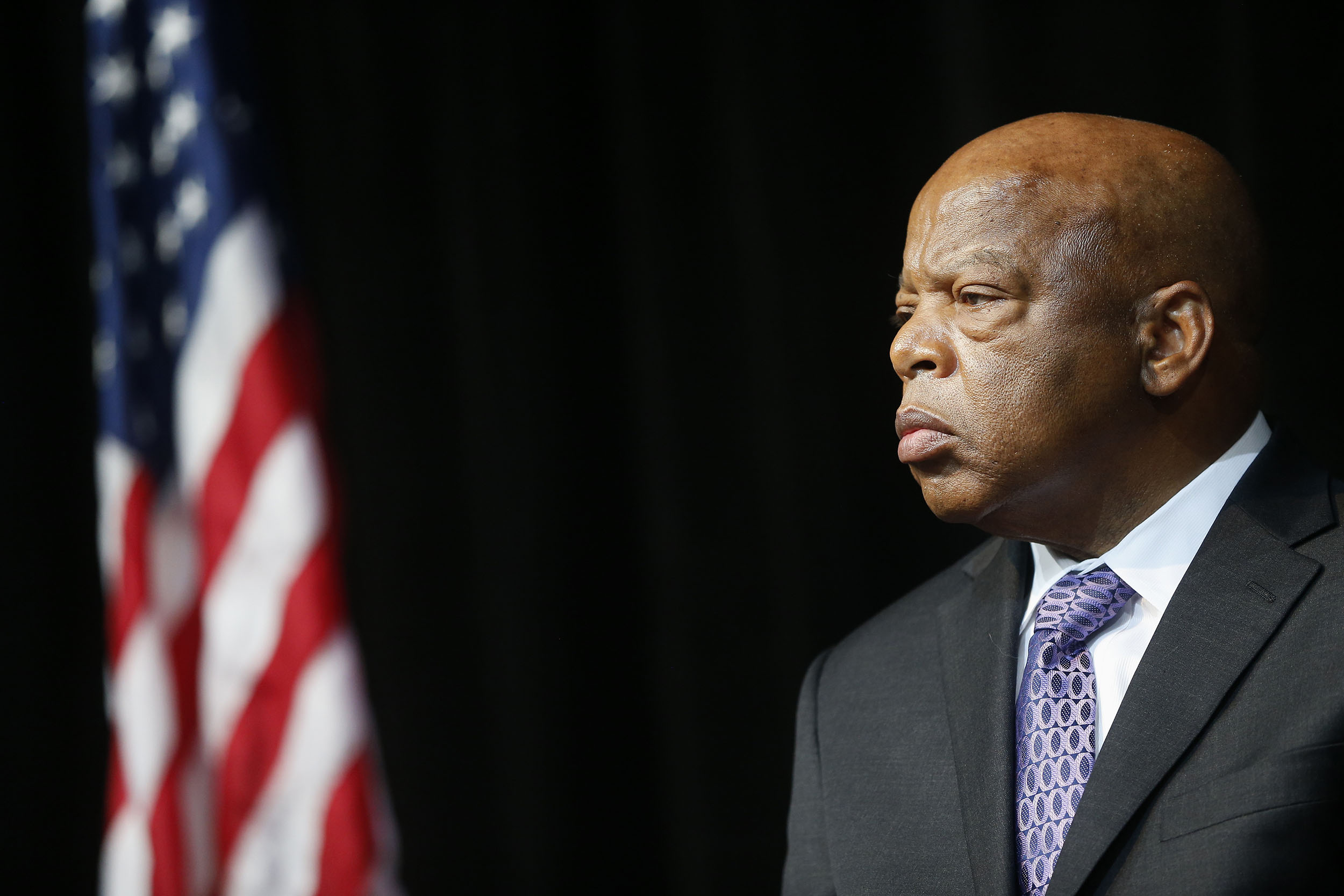 Civil rights activist and Rep. John Lewis, D-Ga. is introduced before speaking at the unveiling of a U.S. Postal Service stamp commemorating the 50th anniversary of the March on Washington, on Friday, August 23, 2013, in Washington, DC. 