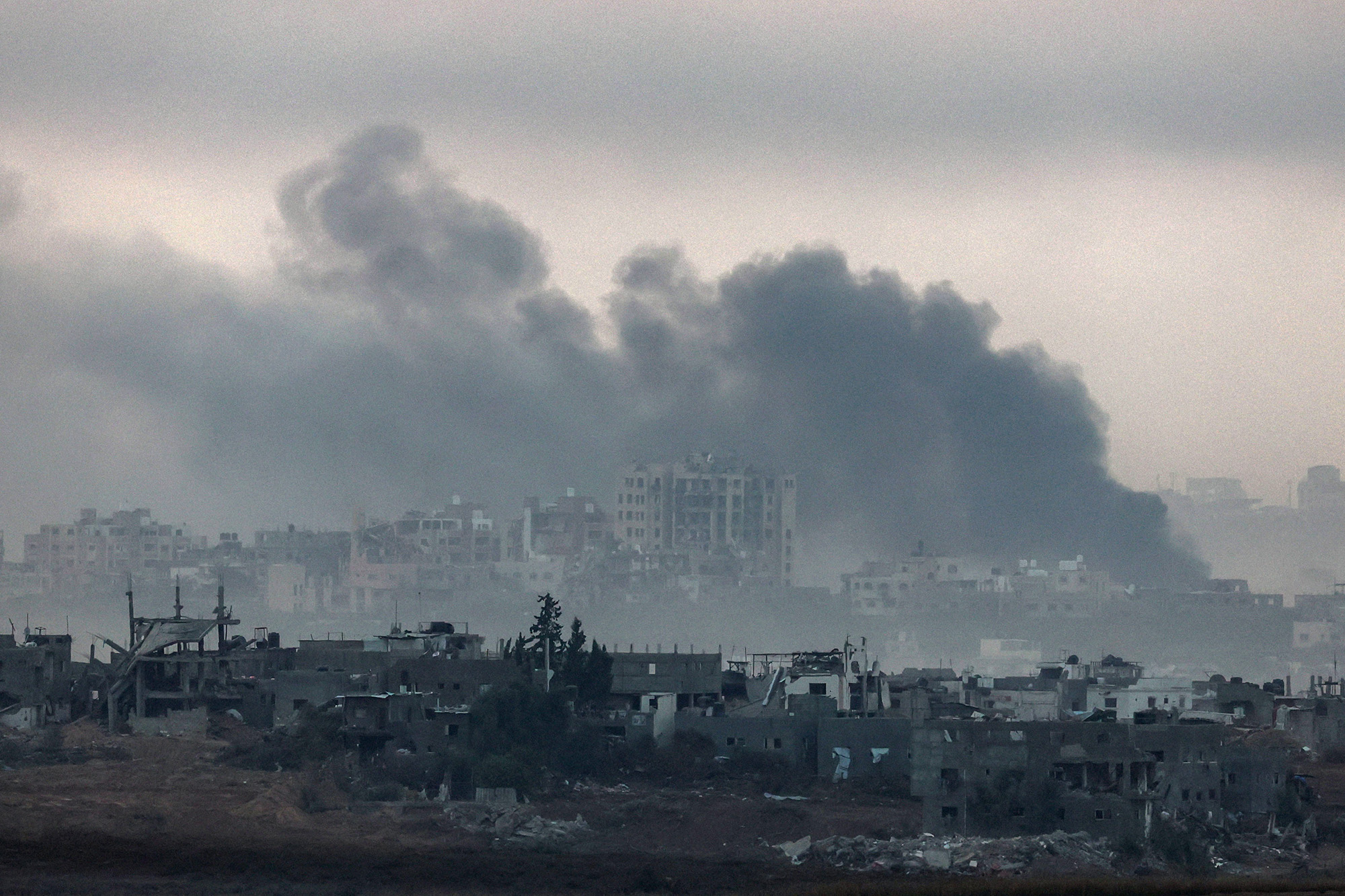 The view from southern Israel near the border with Gaza shows smoke billowing during Israeli bombardment on December 4.