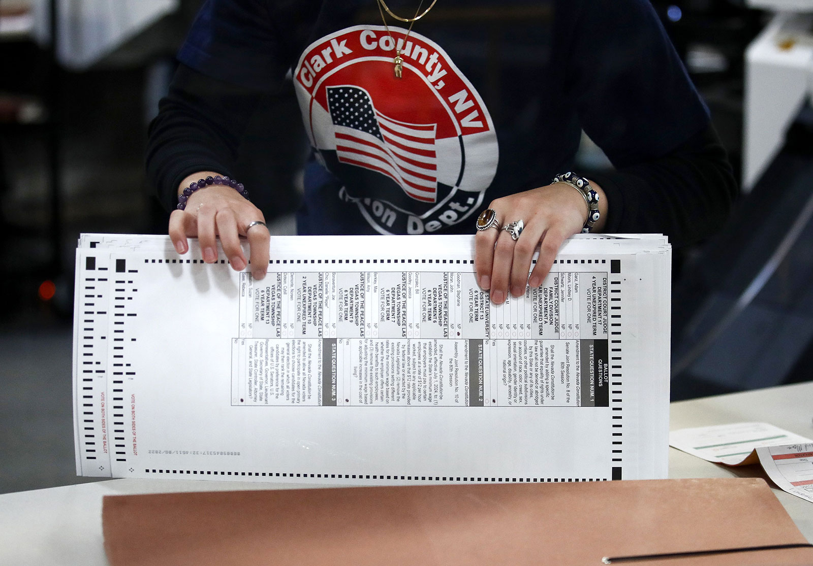 An election worker prepares ballots to be processed at the Clark County Election Department in North Las Vegas on November 9. 